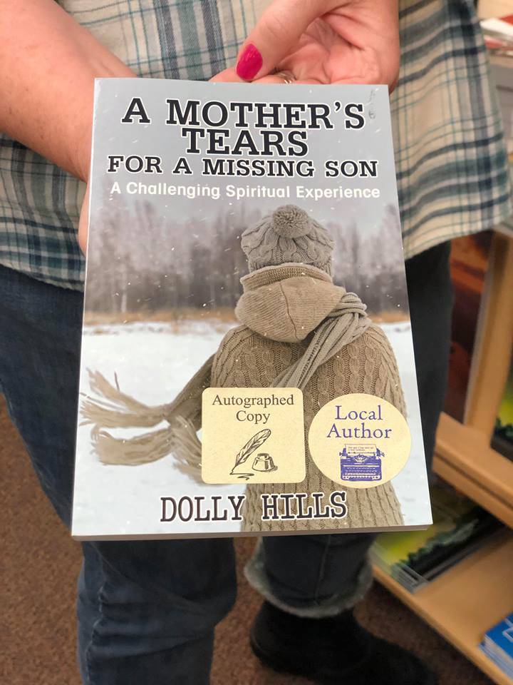 At River City Books, shoppers can easily find books written by local authors by searching for the store’s local author sticker on the cover of the book, on Friday, Dec. 14, 2018, in Soldotna, Alaska. (Photo by Victoria Petersen/Peninsula Clarion)