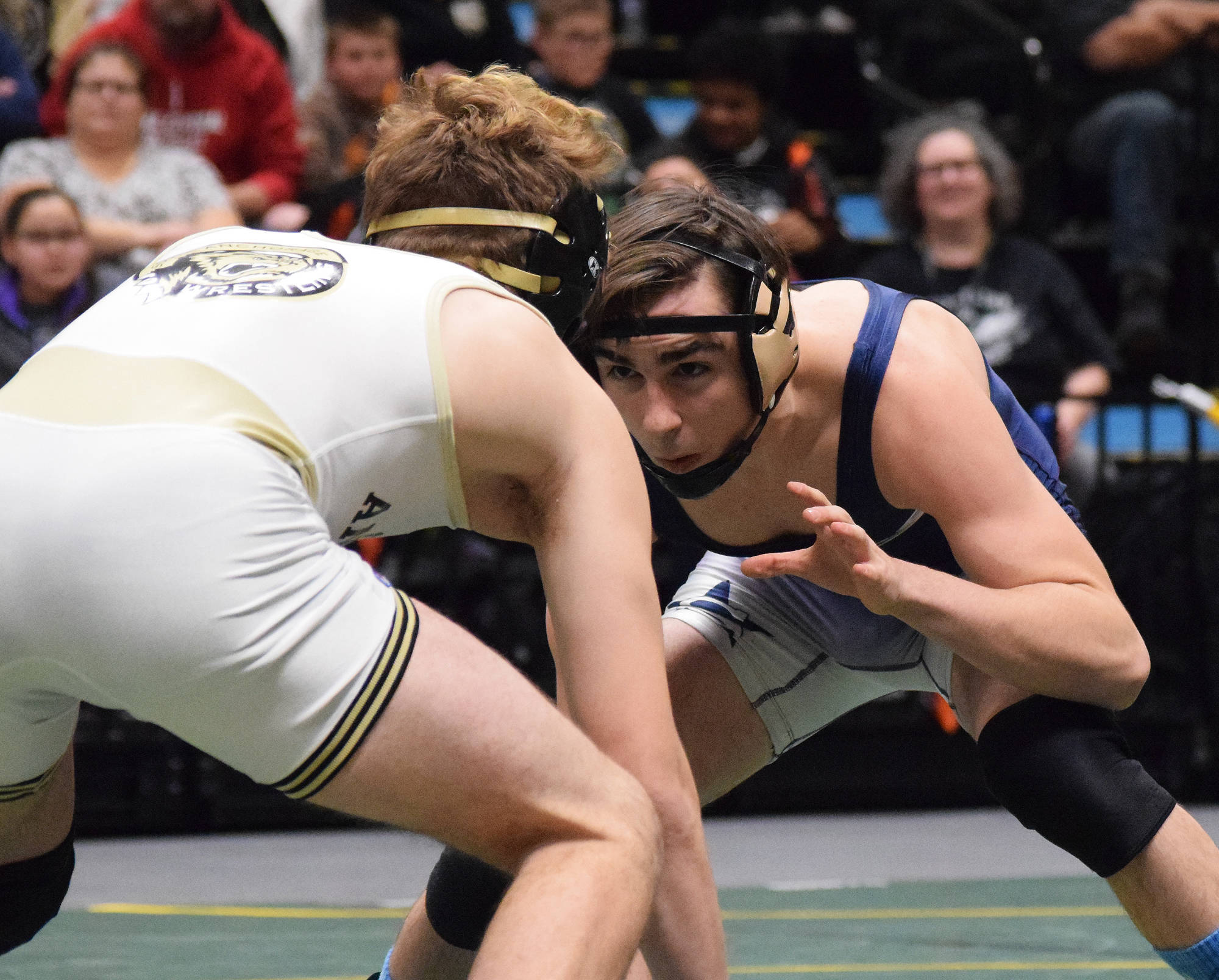 Soldotna senior Gideon Hutchison takes on South’s Jacob Shack in the 130-pound final Saturday night at the Div. I state wrestling championships at the Alaska Airlines Center in Anchorage. (Photo by Joey Klecka/Peninsula Clarion)