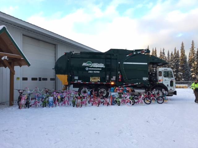 Alaska Waste donates kids’ bikes to Love Inc.