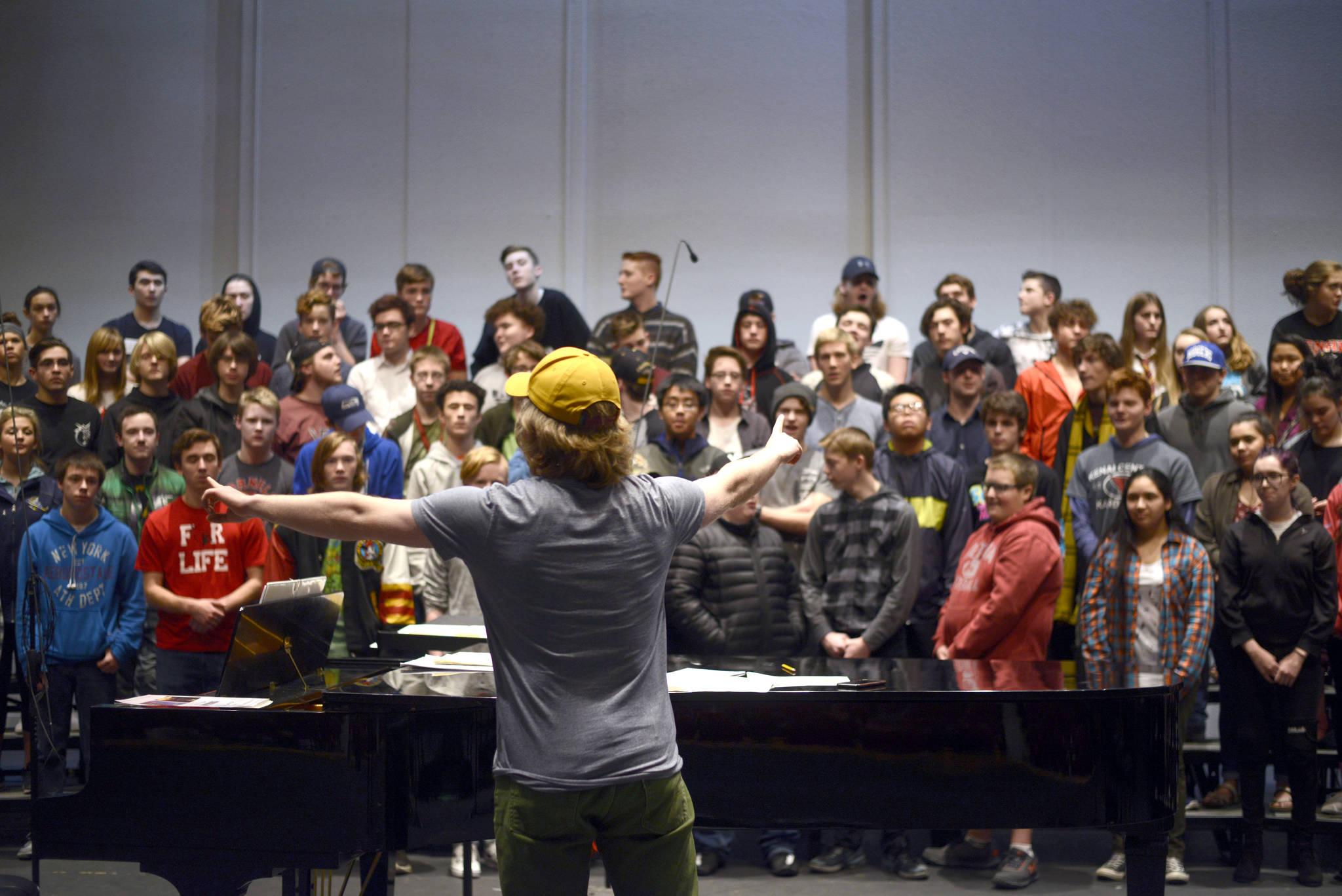 Simon Nissen organizes students in his choir class, grouping singers of similar vocals in the same section on December 15, 2017 at Kenai Central High School in Kenai, Alaska. (Photo by Kat Sorensen/Peninsula Clarion)                                Simon Nissen organizes students in his choir class, grouping singers of similar vocals in the same section on December 15, 2017 at Kenai Central High School in Kenai, Alaska. (Photo by Kat Sorensen/Peninsula Clarion)                                 Simon Nissen organizes students in his choir class, grouping singers of similar vocals in the same section on Dec. 15, 2017 at Kenai Central High School in Kenai, Alaska. (Photo by Kat Sorensen/Peninsula Clarion)