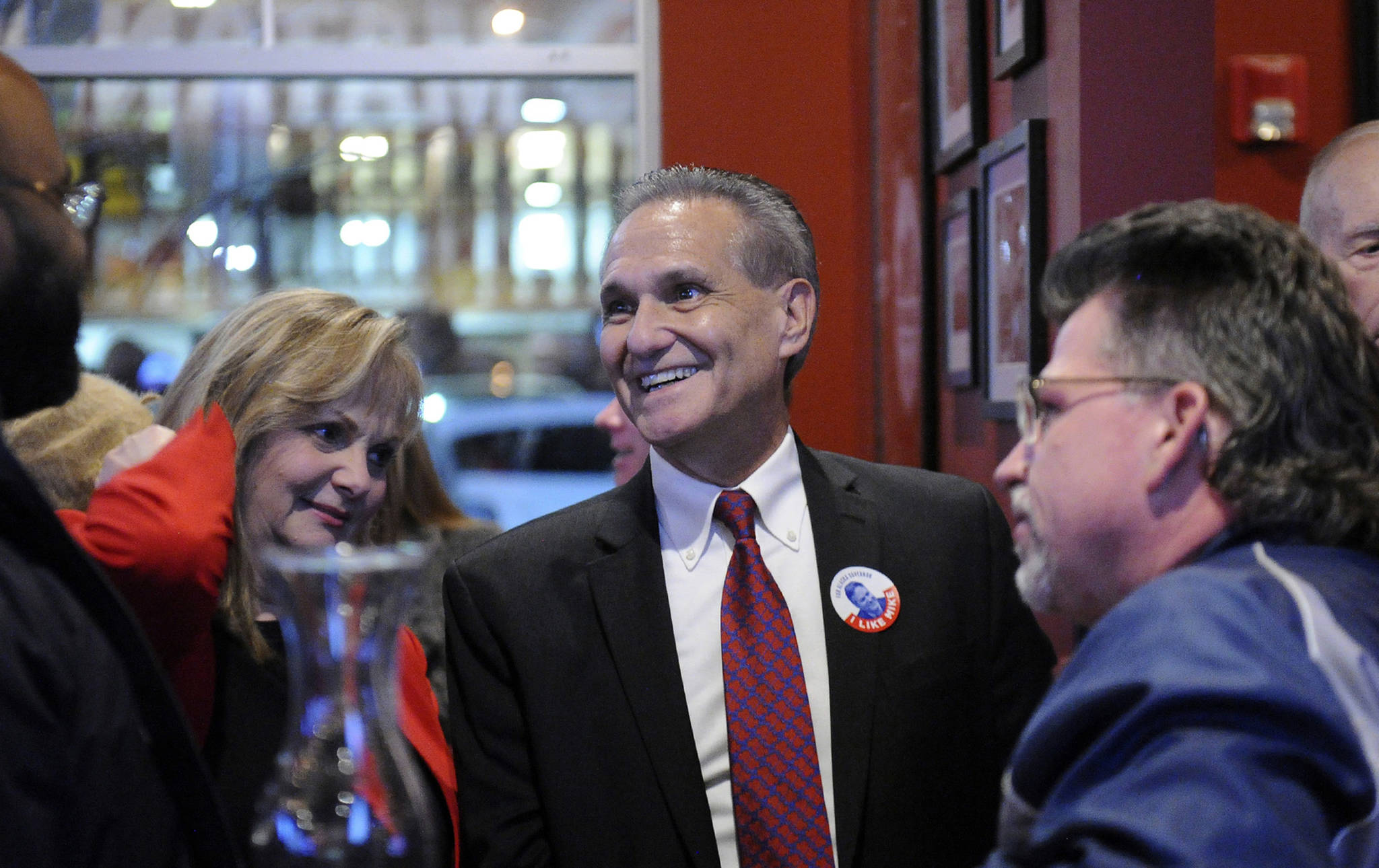 Lt. Gov. Kevin Meyer, R-Anchorage, center, talks with supporters in Anchorage on Nov. 6. Meyer is calling or an audit of Alaska’s election system. (Photo/Michael Dinneen/AP)