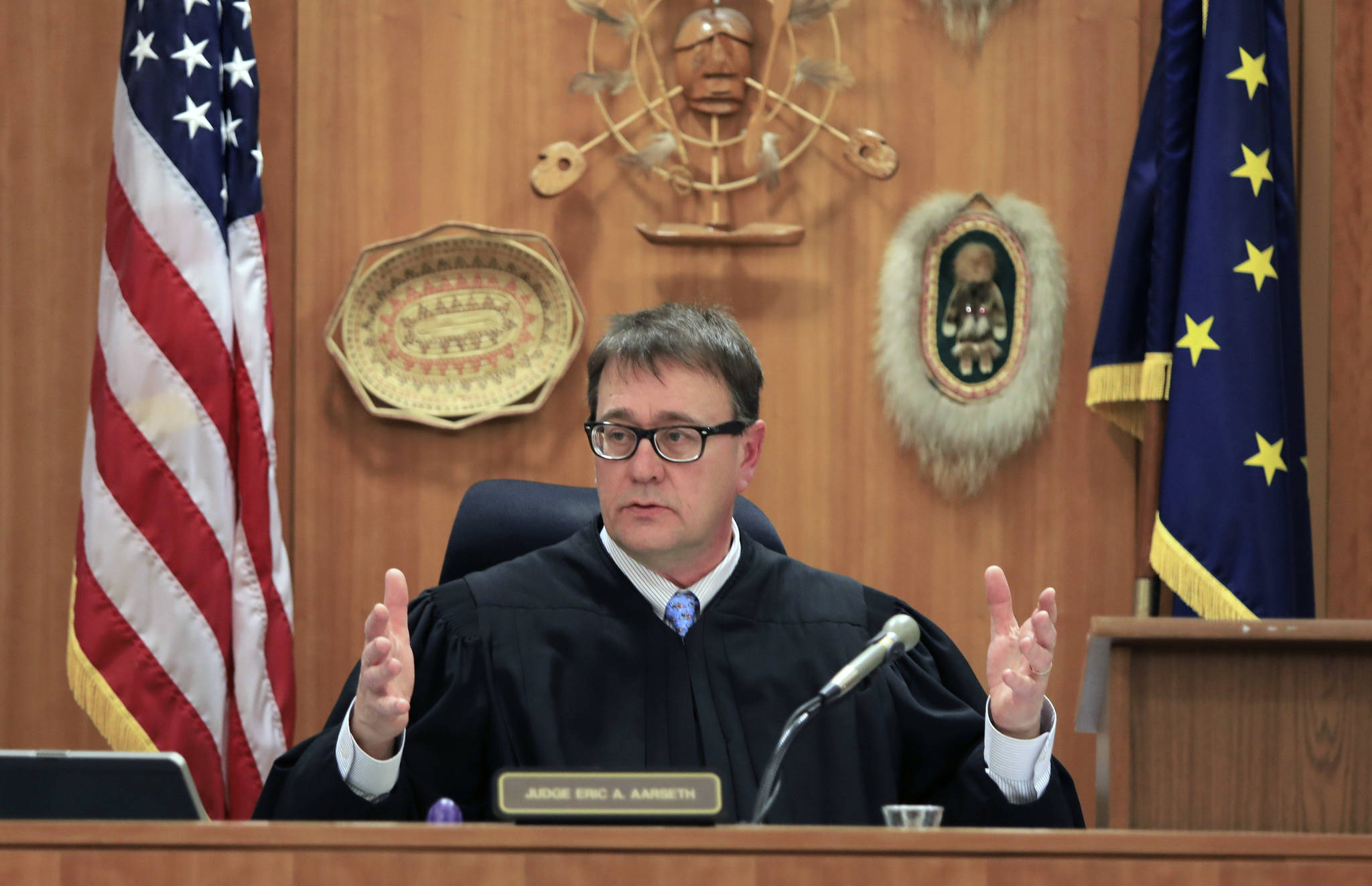Anchorage Superior Court Judge Eric Aarseth speaks at an appeal of a recount in a Fairbanks state house race on Thursday, Dec. 20, 2018, in Anchorage, Alaska. The Alaska Supreme Court appointed Aarseth as a special master to prepare a report on an appeal of a recount in the race between Republican Bart LeBon and Democrat Kathryn Dodge. LeBon held a one-vote lead after the recount. (AP Photo/Dan Joling)