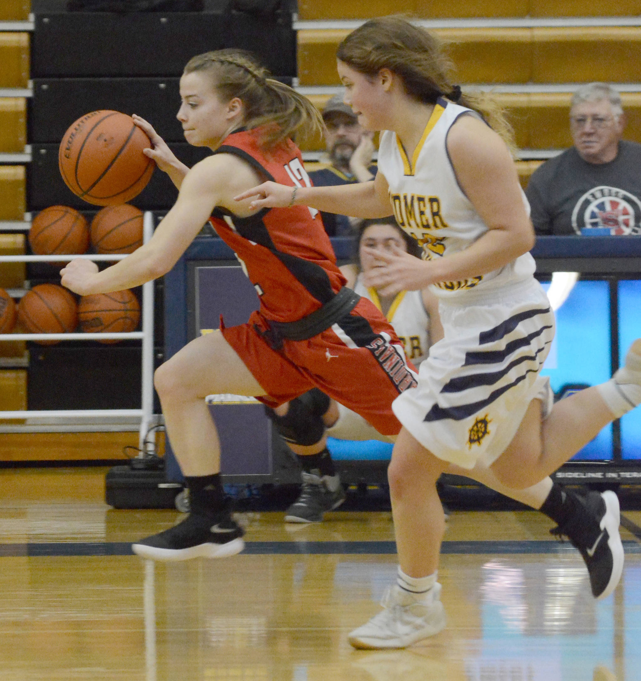 Kenai Central’s Hayley Maw dribbles against Homer on Friday, Dec. 21, 2018, in Homer, Alaska. (Photo by Michael Armstrong/Homer News)