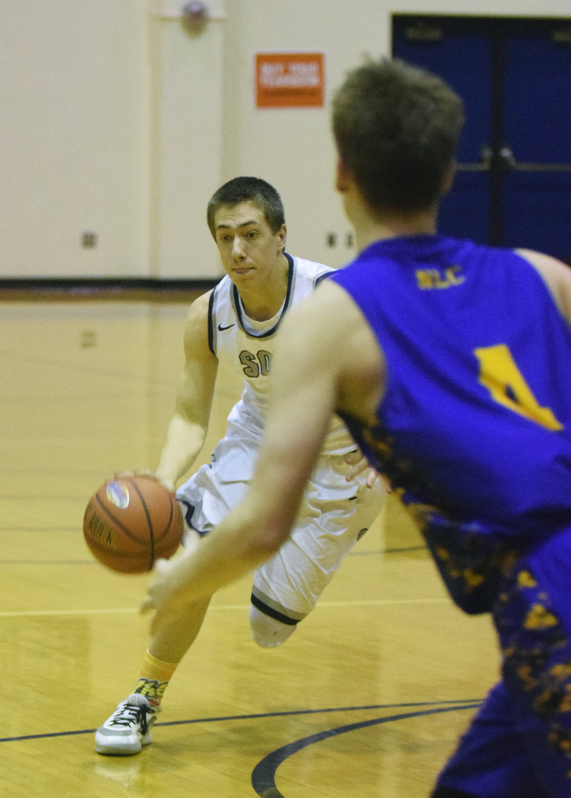 Soldotna sophomore Jersey Truesdell looks for an opening against the Kodiak defense Jan. 18, 2018, at Soldotna High School. (Photo by Joey Klecka/Peninsula Clarion)