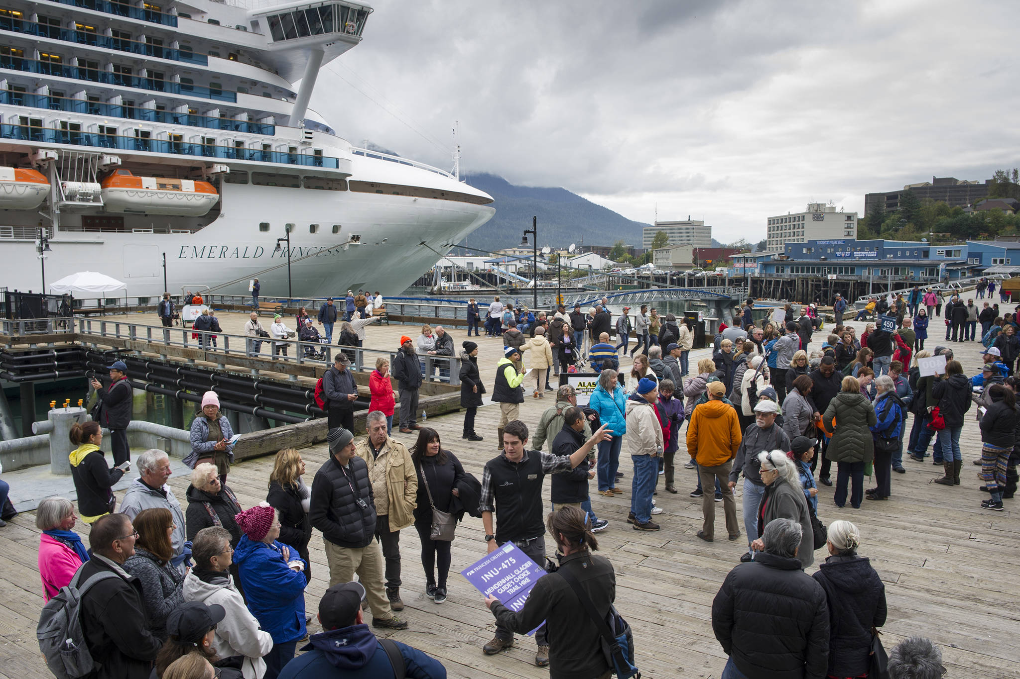 Cruise ship visitors gather for their tours on the Seawalk in Juneau on Sept. 13, 2017. (File photo)