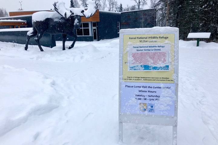 A sign is posted outside the Kenai National Wildlife Refuge Visitors Center that lets residents know that due to the partial government shutdown, refuge employees and visitor services are unavailable and that visitors should enter the refuge at their own risk, on Thursday, in Soldotna. (Photo by Victoria Petersen/Peninsula Clarion)