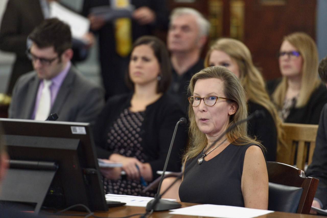 Donna Arduin, right, director of the Office of Budget and Management, speaks to the Senate Finance Committee at the Capitol on Wednesday, Jan. 23, 2019. (Michael Penn | Juneau Empire)