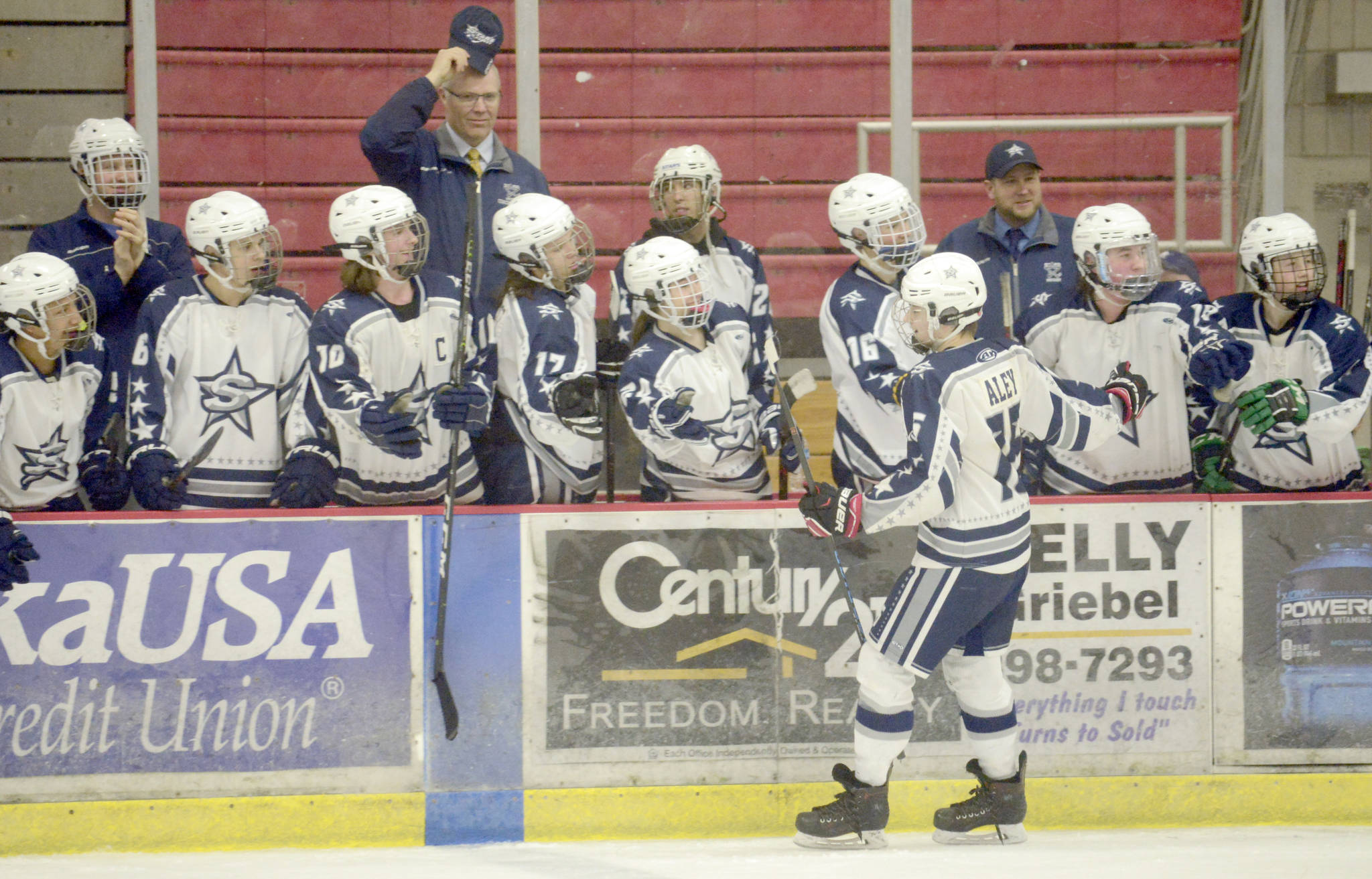 Soldotna’s David Aley celebrates his hat trick with his team Friday, Jan. 24, 2019, at the Soldotna Regional Sports Complex. (Photo by Jeff Helminiak/Peninsula Clarion)