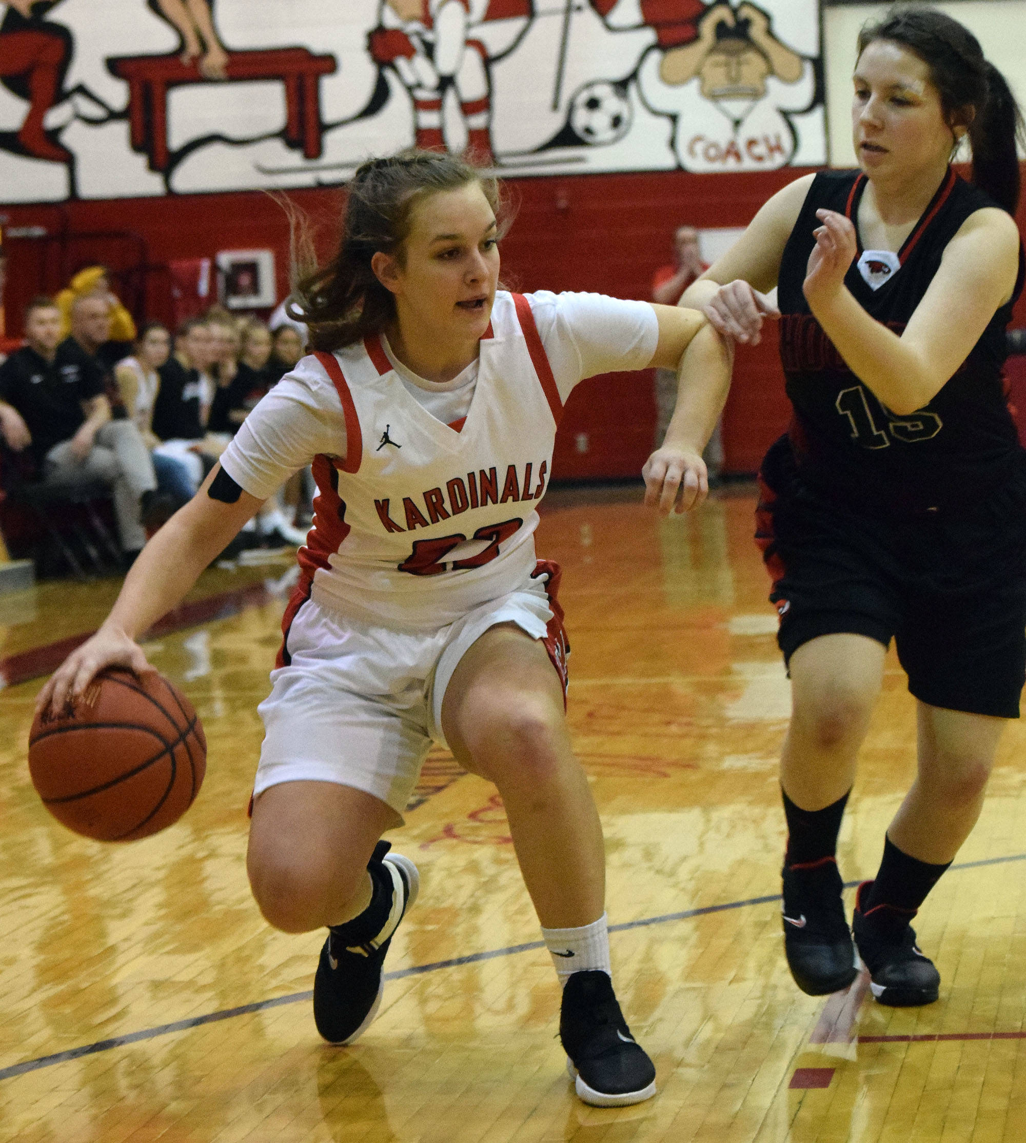 Kenai’s Jaiden Streiff looks for space against Houston’s Icis Garcia Saturday afternoon at Kenai Central High School. (Photo by Joey Klecka/Peninsula Clarion)