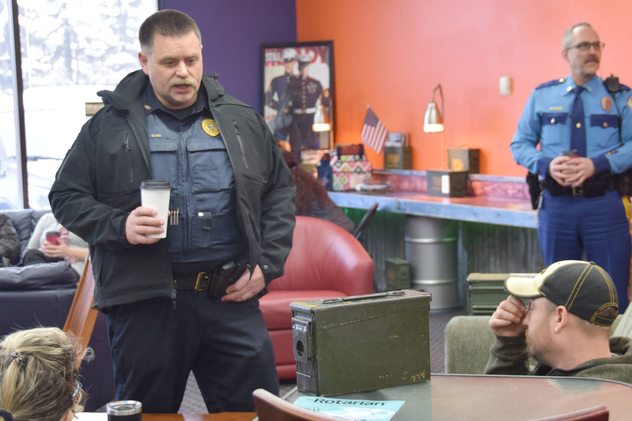 Kenai Police Chief David Ross answers questions from citizens at Ammo Can Coffee in Soldotna on Wednesday. (Photo by Brian Mazurek/Peninsula Clarion)