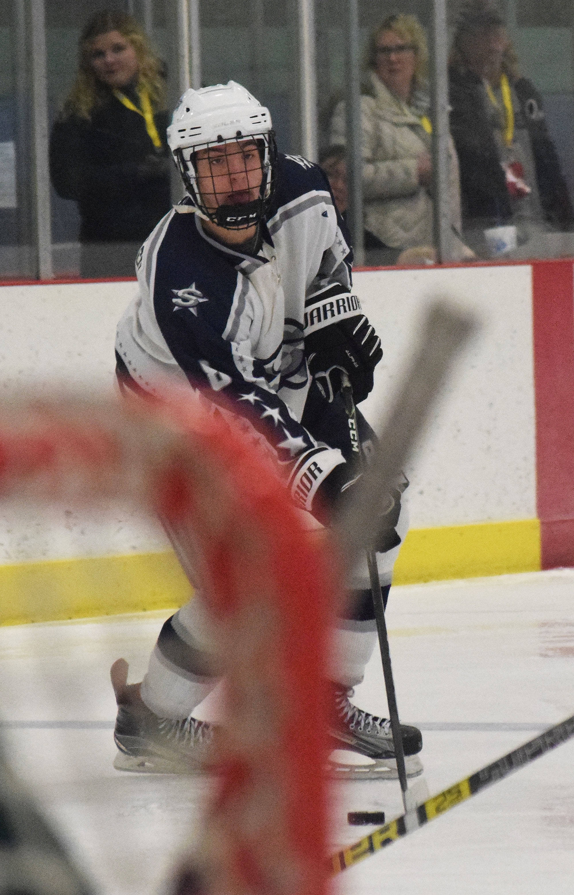 Soldotna’s J.D. Schmelzenbach looks for an open shot Thursday against the Delta Huskies at the Div. II state hockey championship tournament in Wasilla. (Photo by Joey Klecka/Peninsula Clarion)