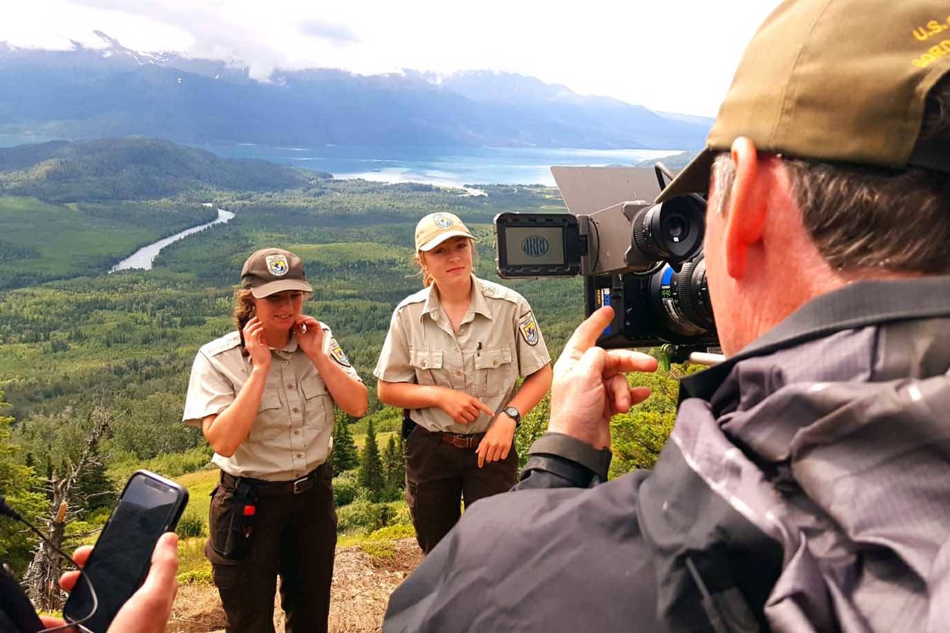 Laura Bashor and Amber Robbins, two biological interns at the Kenai National Wildlife Refuge, being filmed this past summer for an Animal Planet series on top of Hideout Trail. (Photo provided by refuge)