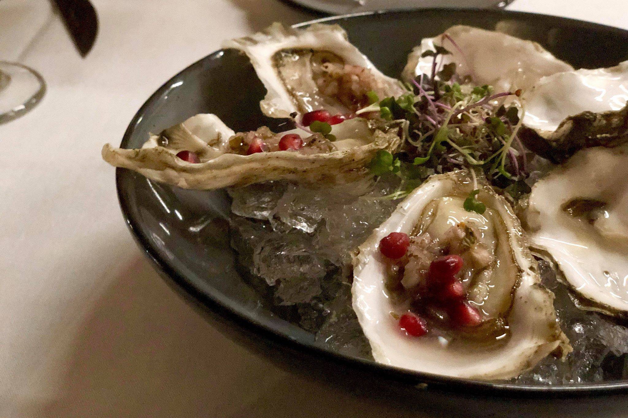 Addie Camp Train Eatery and Wine Bar strives to feature local food on their menu as much as possible, like oysters from Jacalof Bay, on Monday, Dec. 31, 2018, in Soldotna, Alaska. (Photo by Victoria Petersen/Peninsula Clarion)