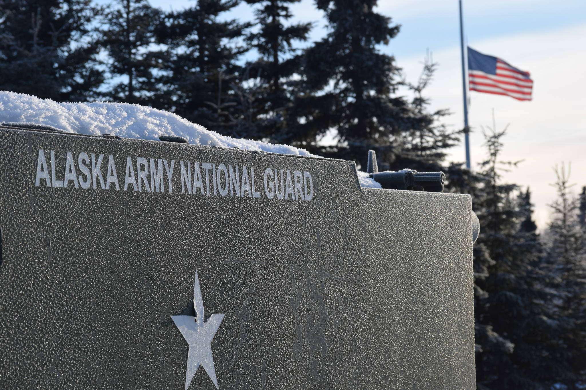 A tank outside the Kenai Readiness Center for the Alaska Army National Guard sits with a covering of snow on Friday. (Photo by Brian Mazurek/Peninsula Clarion)