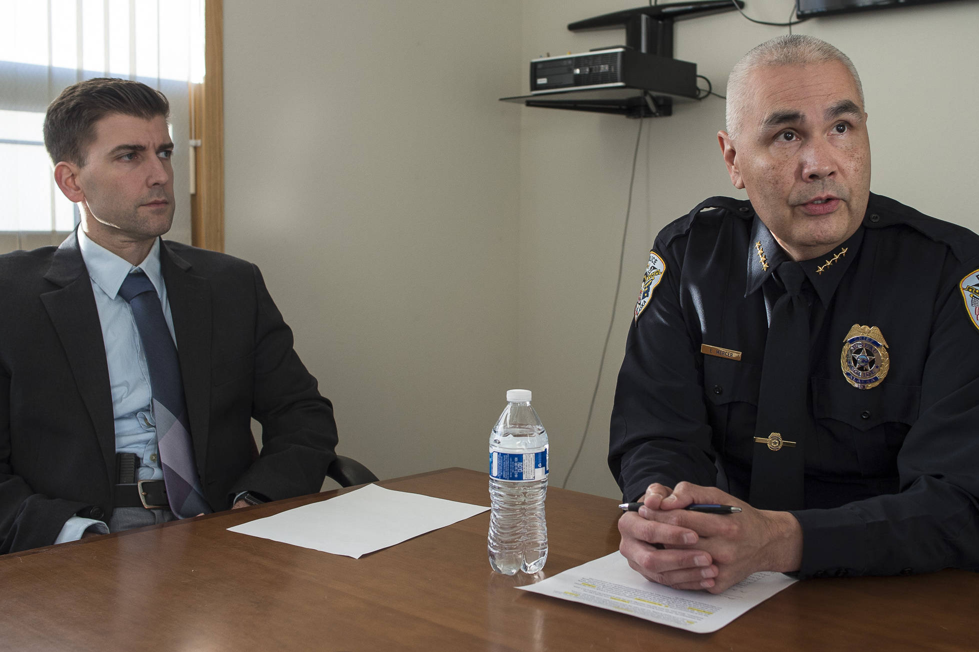 Juneau Police Department Police Chief Ed Mercer, right, and Lt. Jeremy Weske speak at the Juneau Police Station about the department receiving new funding for drug enforcement on Friday, Jan. 4, 2019. Alaska has been designated as a High Intensity Drug Trafficking Area (HIDTA). (Michael Penn | Juneau Empire)