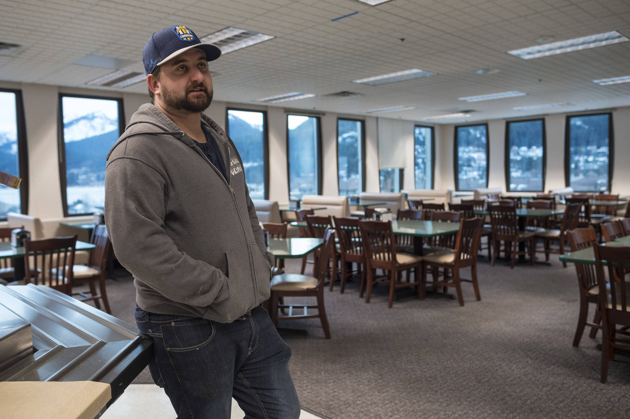 Erik Scholl, who owns cafes at the Hurff Ackerman Saunders Federal Building and the State Office Building in Juneau, talks Wednesday about having about half the patrons at the Federal Building location since the partial federal shutdown started on Saturday, Dec. 22, 2018. (Michael Penn/Juneau Empire)