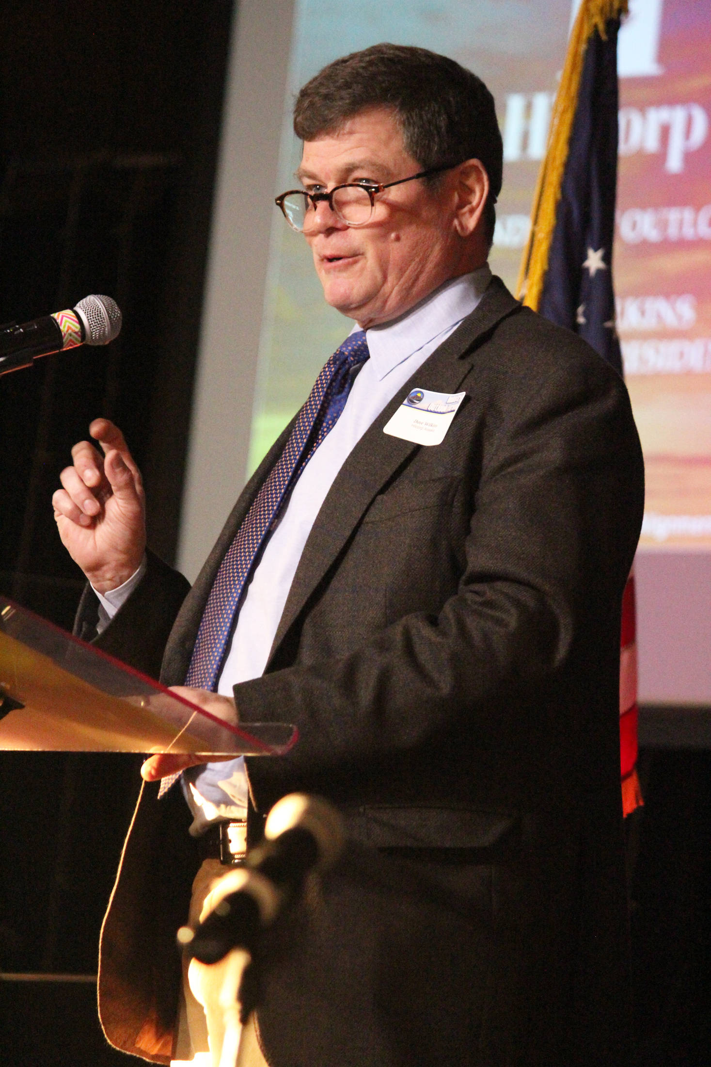 Hilcorp Alaska Senior Vice President Dave Wilkins presents to a crowd at this year’s Industry Outlook Forum on Wednesday, Jan. 9, 2019 at Christian Community Church in Homer, Alaska. (Photo by Megan Pacer/Homer News)