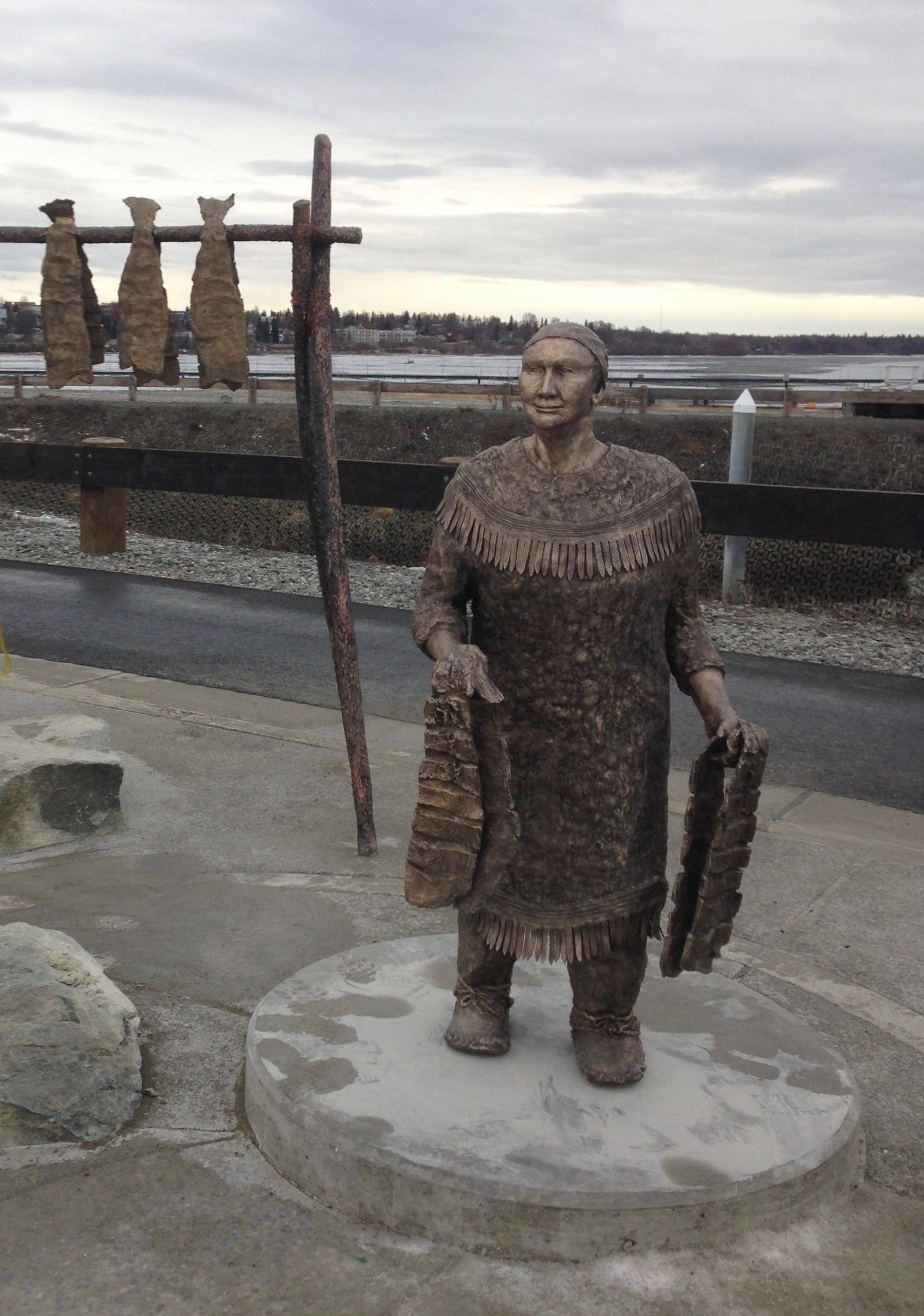 A bronze statue near Anchorage’s Ship Creek represents Olga, an elder and matriarch for the Dena’ina people north of Anchorage. (Photo courtesy of Joel Isaak)