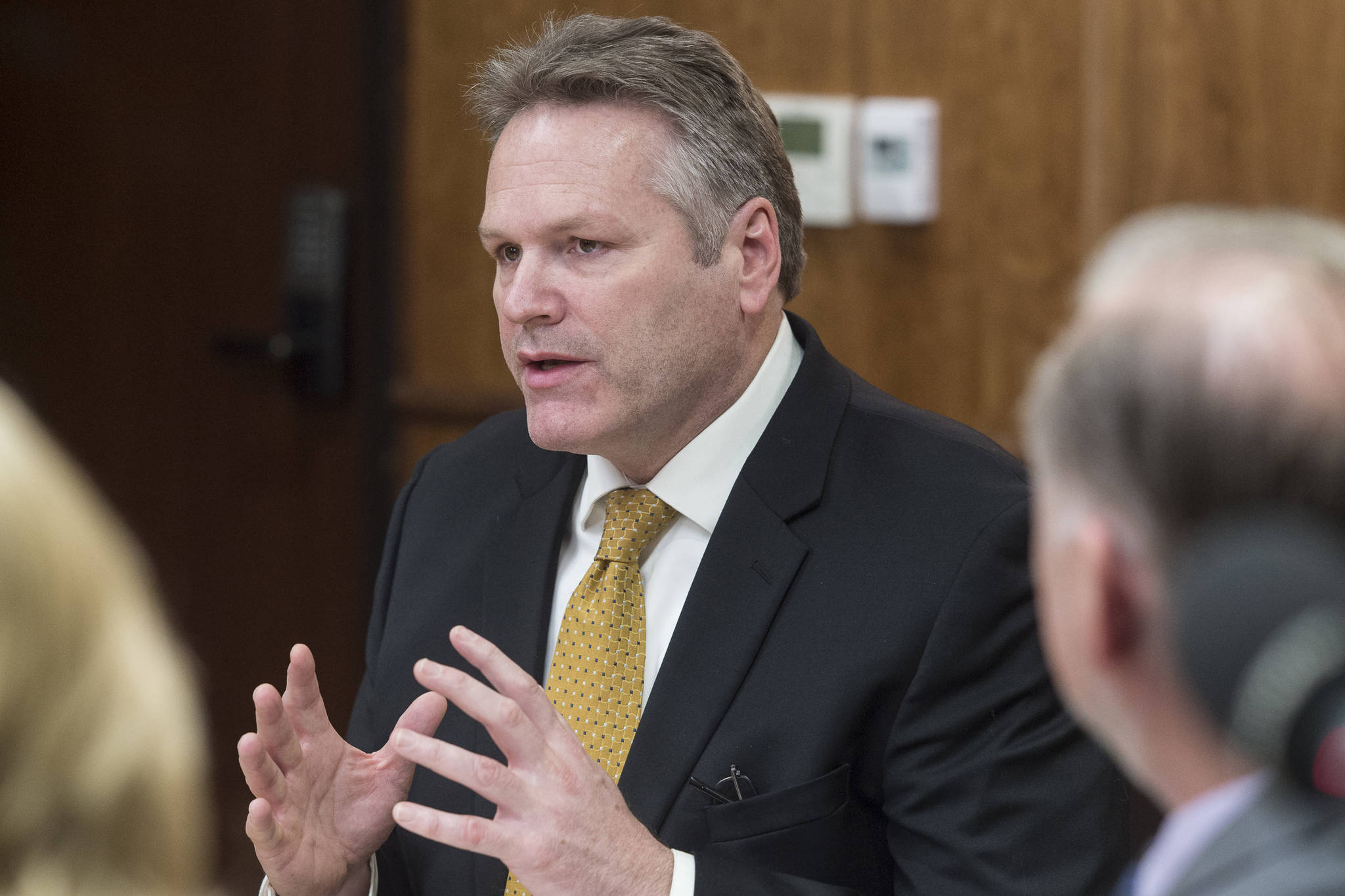 Gov. Mike Dunleavy speaks with his cabinet members at the Capitol on Tuesday, Jan. 8, 2019. (Michael Penn | Juneau Empire)