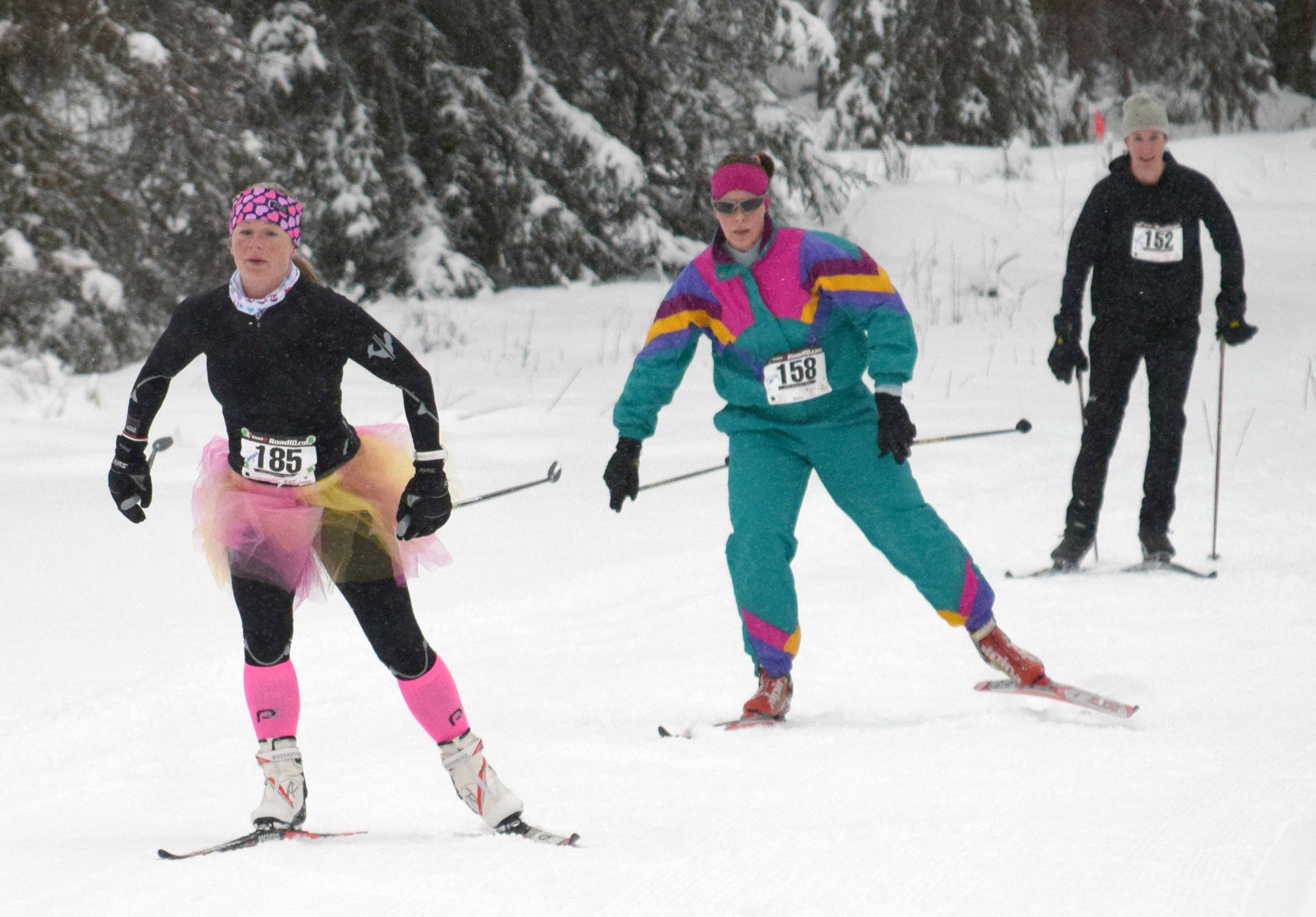 Eventual race winner Morgan Aldridge leads Carly Reimer and Amy Anderson at the Ski for Women on Sunday, Feb. 3, 2019, at Tsalteshi Trails. (Photo by Jeff Helminiak/Peninsula Clarion)