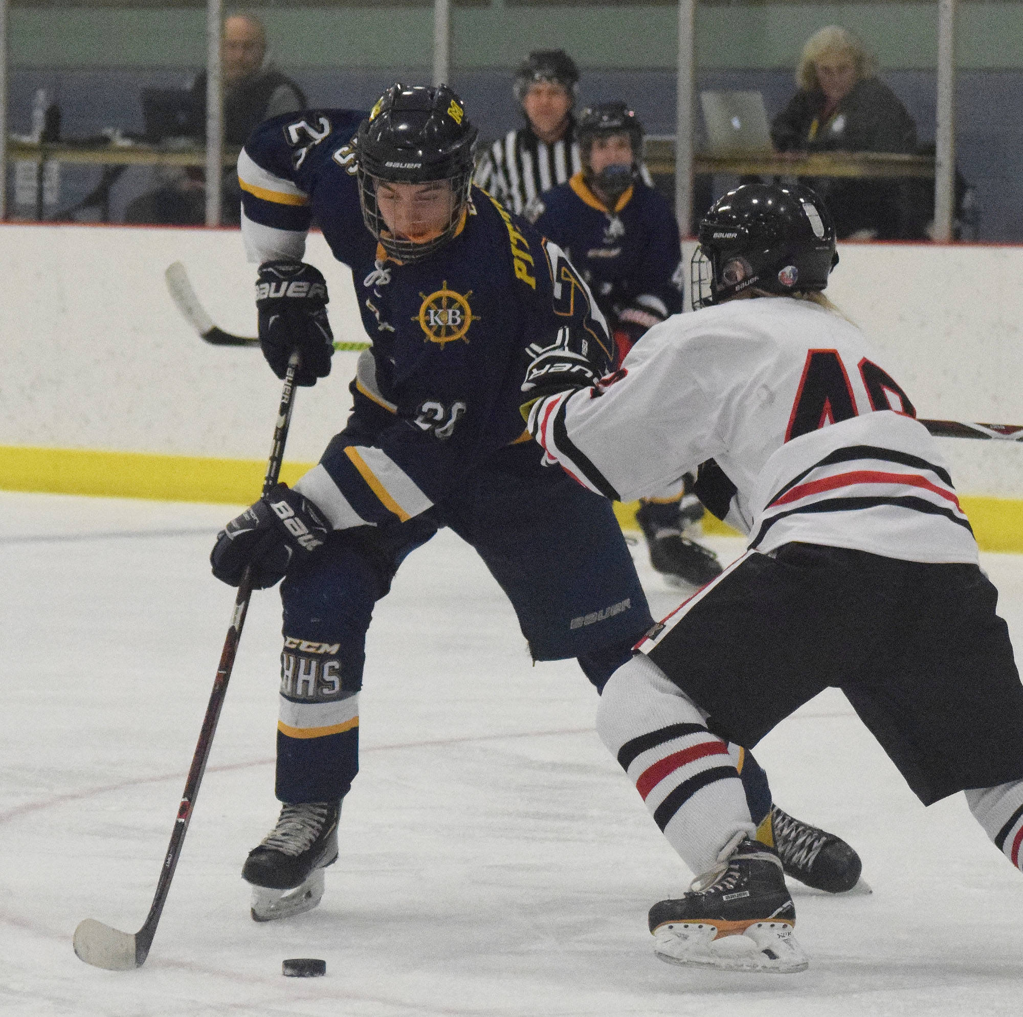 Homer’s Ethan Pitzman negotiates around Juneau’s Ethan Welch Friday in a Div. II state semifinal at the Curtis Menard Sports Complex in Wasilla. (Photo by Joey Klecka/Peninsula Clarion)