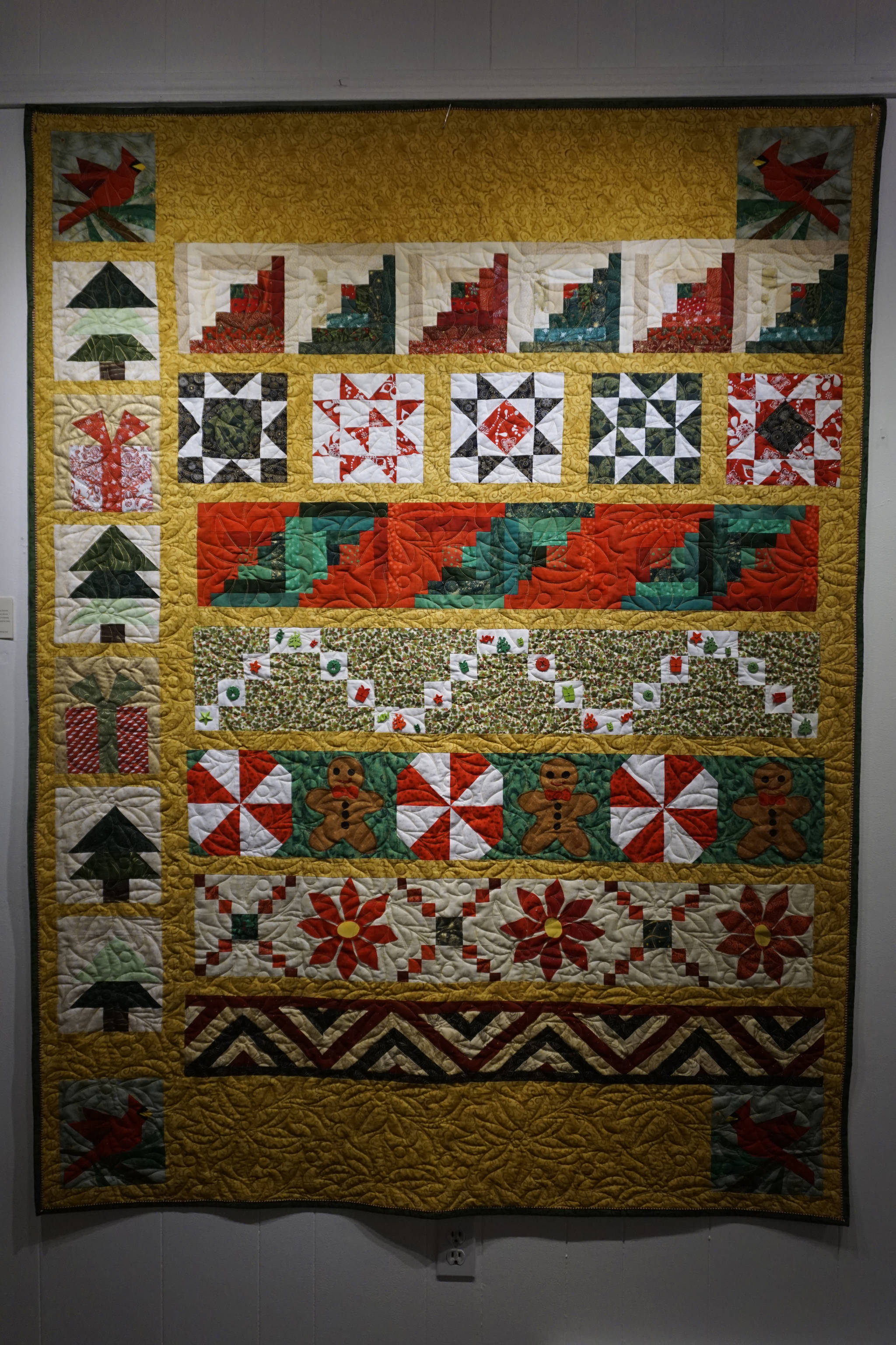 Donna Hinkle’s “Christmas Quilt,” one of the works in the “9 Women / 9 Quilts” show that opened last Friday, Feb. 1, 2019, at the Homer Council on the Arts, in Homer, Alaska. (Photo by Michael Armstrong/Homer News)