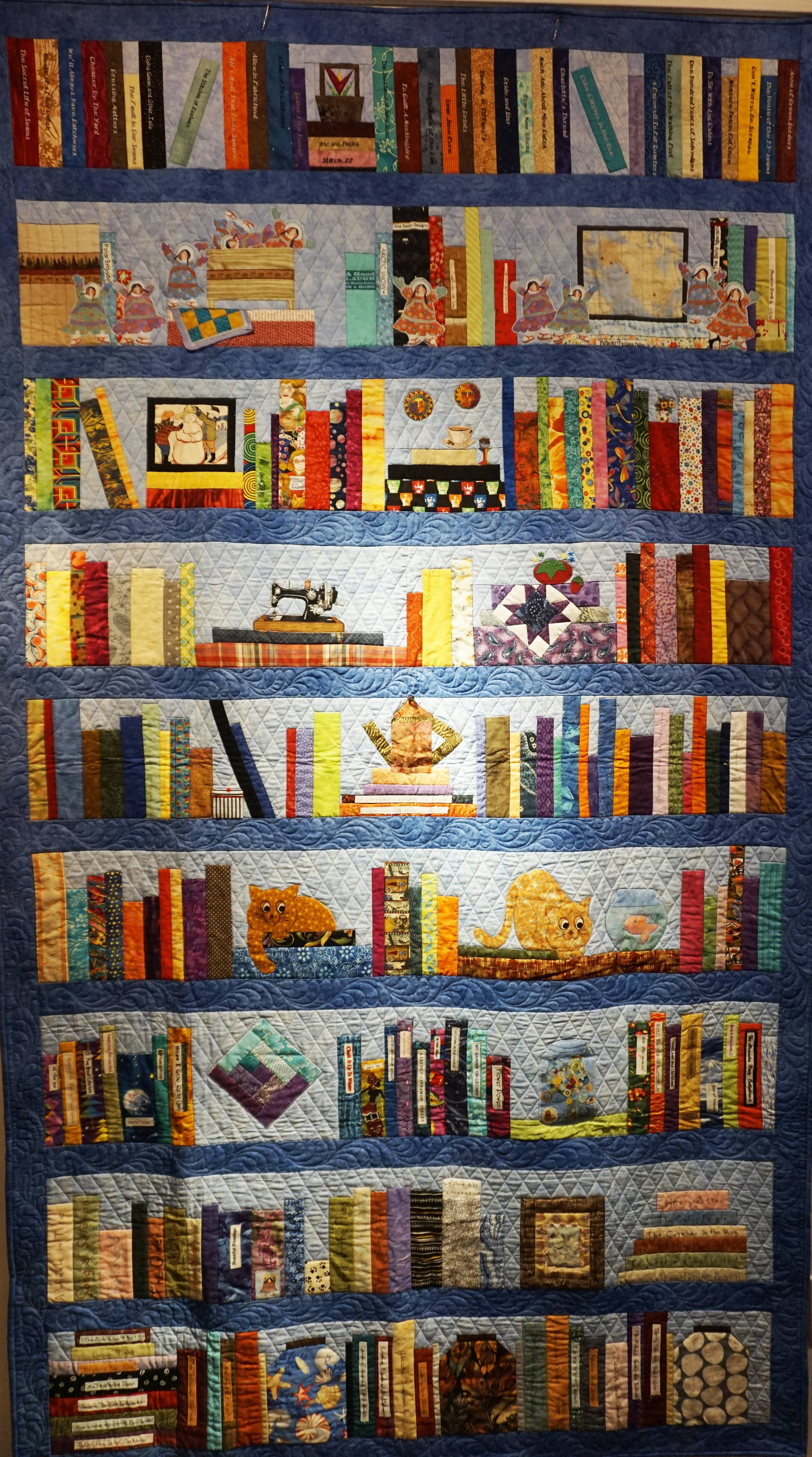 Ruby Nofziger’s “On a Bookshelf” quilt, one of the works in the “9 Women / 9 Quilts” show that opened last Friday, Feb. 1, 2019, at the Homer Council on the Arts, in Homer, Alaska. (Photo by Michael Armstrong/Homer News)