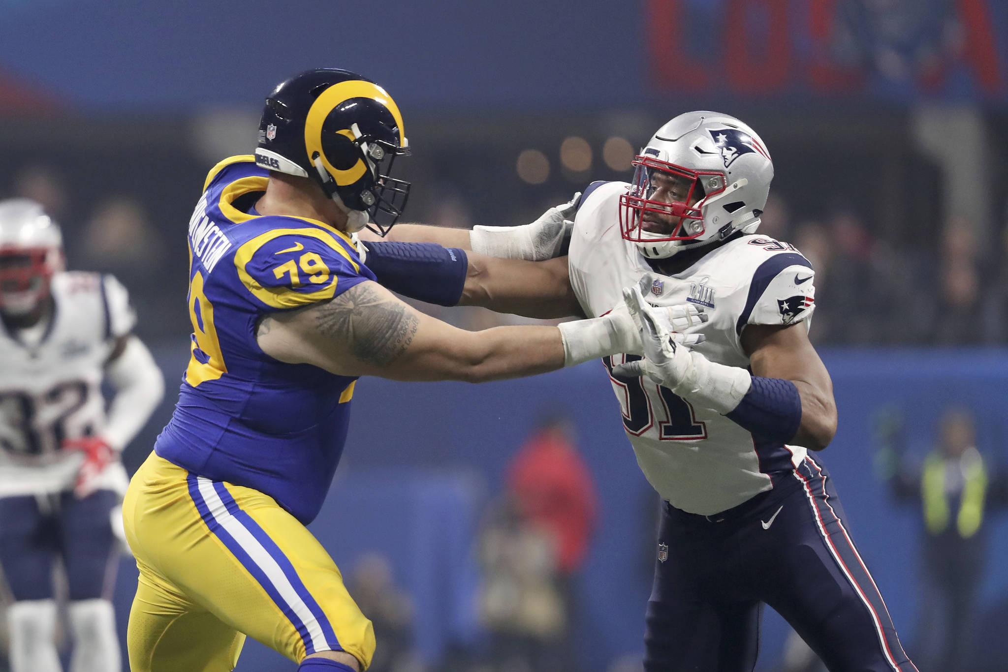 New England Patriots Deatrich Wise Jr. #91 in action against the Los Angeles Rams during NFL Super Bowl 53, Sunday, February 3, 2019 in Atlanta. The Patriots won 13-3. (AP Photo/Gregory Payan)