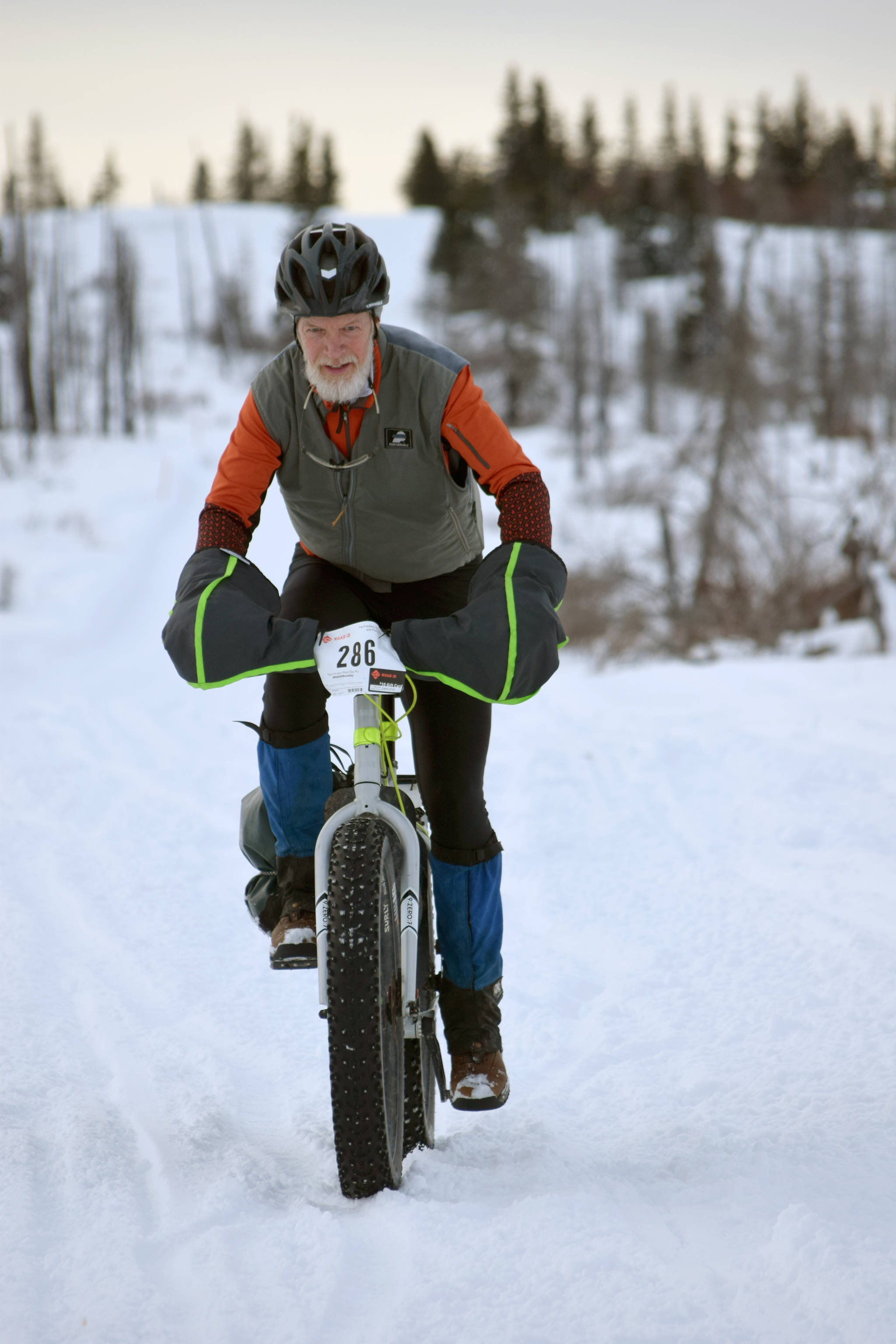 Doug Armstrong finishes off a section of Fat Freddie’s Bike Race and Ramble on Saturday, Feb. 9, 2019, in the Caribou Hills near Freddie’s Roadhouse. (Photo by Jeff Helminiak/Peninsula Clarion)