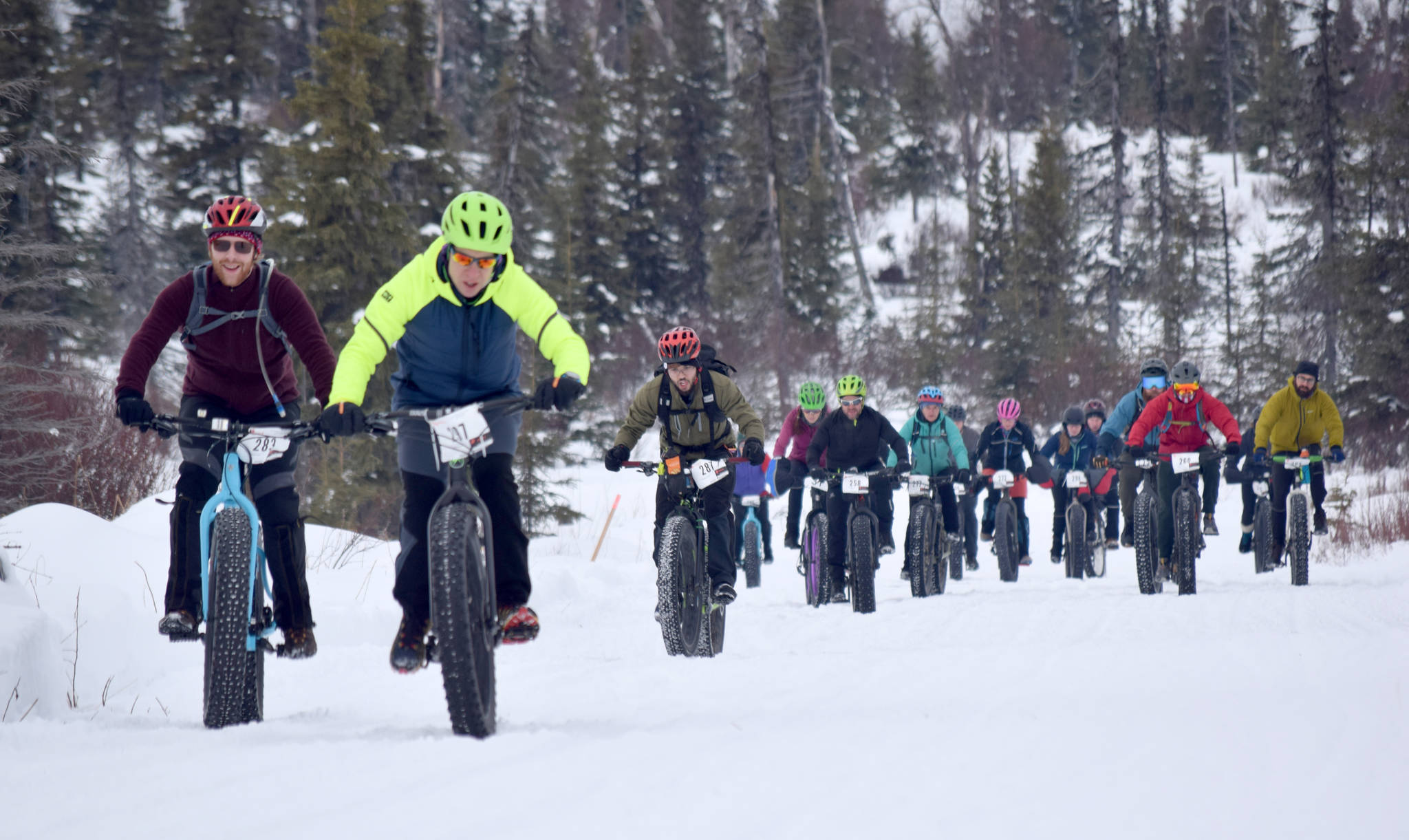 John Iannaconne leads a pack of riders early in Fat Freddie’s Bike Race and Ramble on Saturday, Feb. 9, 2019, in the Caribou Hills near Freddie’s Roadhouse. (Photo by Jeff Helminiak/Peninsula Clarion)