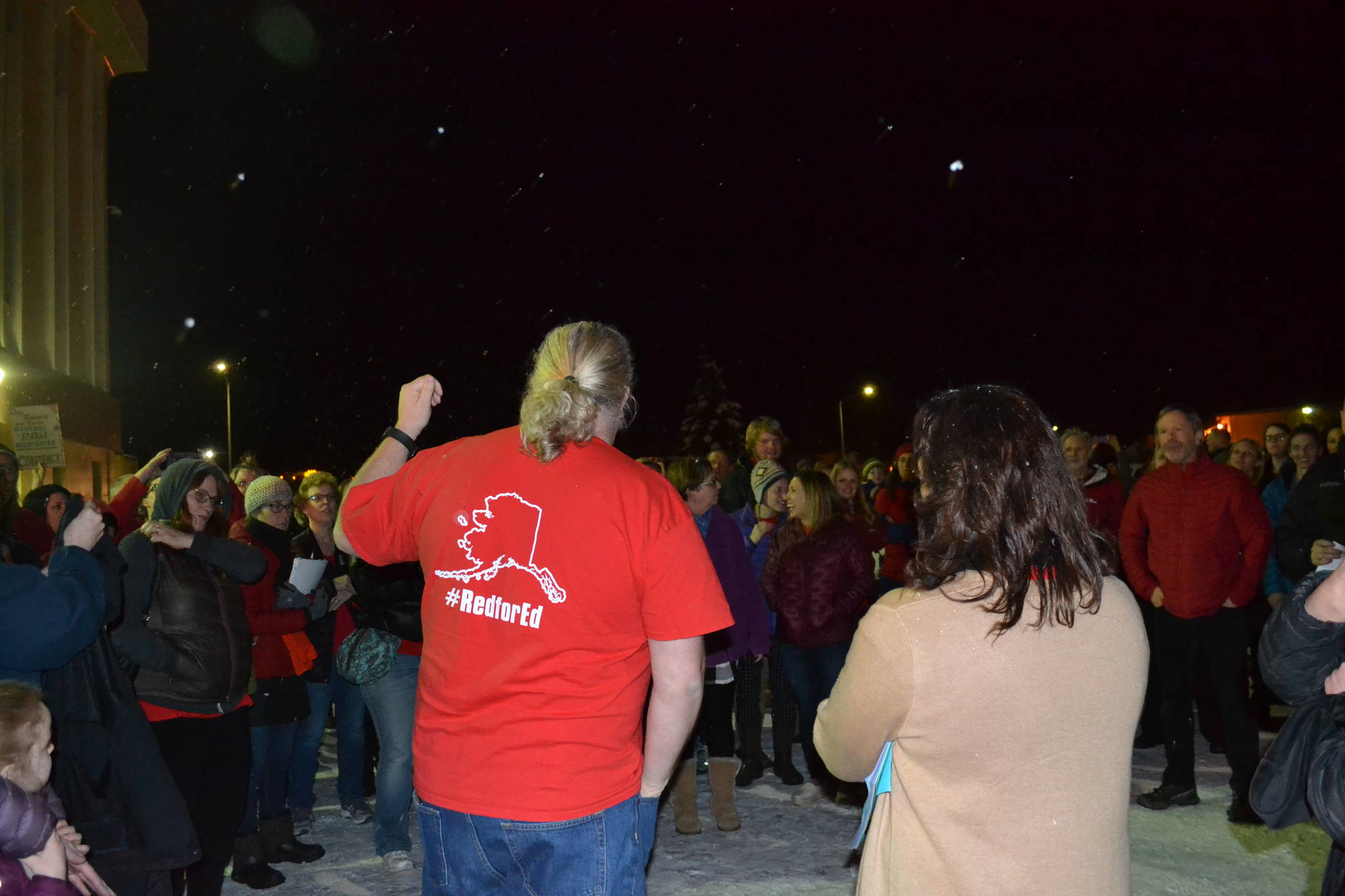 Kenai Peninsula Education Association, David Brighton addresses a crowd of district employees rallying outside of the Betty J. Glick Borough Assembly Chambers during the Kenai Peninsula Borough School District Education Board meeting in Soldotna, Alaska on Monday, Feb. 11, 2019. (Photo by Victoria Petersen/Peninsula Clarion)