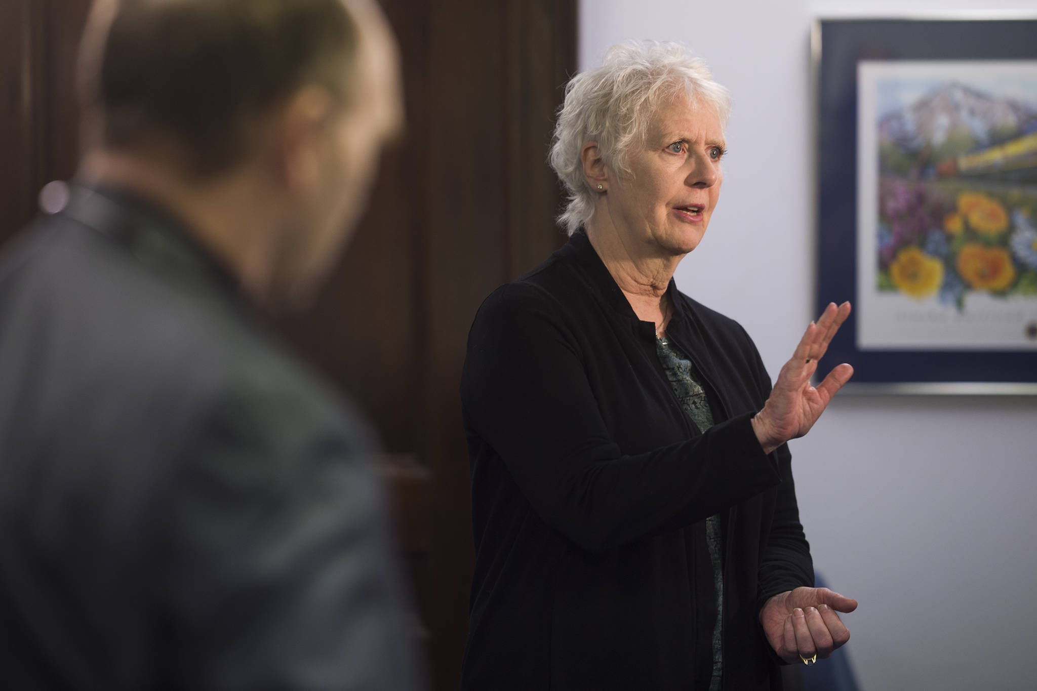 Rep. Louise Stutes, R-Kodiak, talks to the media about why she nominated Rep. Gary Knopp, R-Kenai, for Speaker of the House at the Capitol on Tuesday, Feb. 12, 2019. (Michael Penn | Juneau Empire)