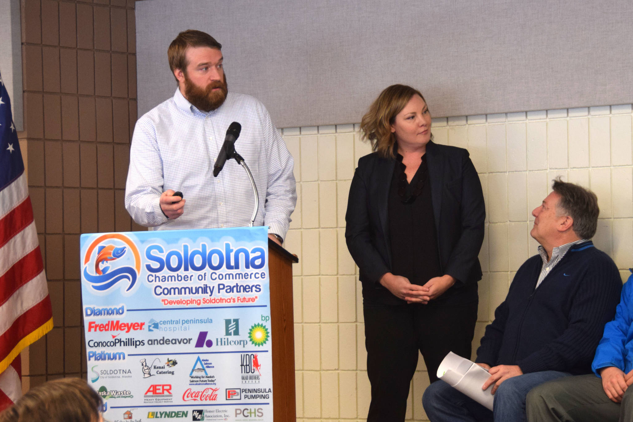 Kyle Kornelis, Stephanie Queen and Tim Dillon speak about the Field House project during a Soldotna Chamber Luncheon on Wednesday. (Photo by Brian Mazurek/Peninsula Clarion)