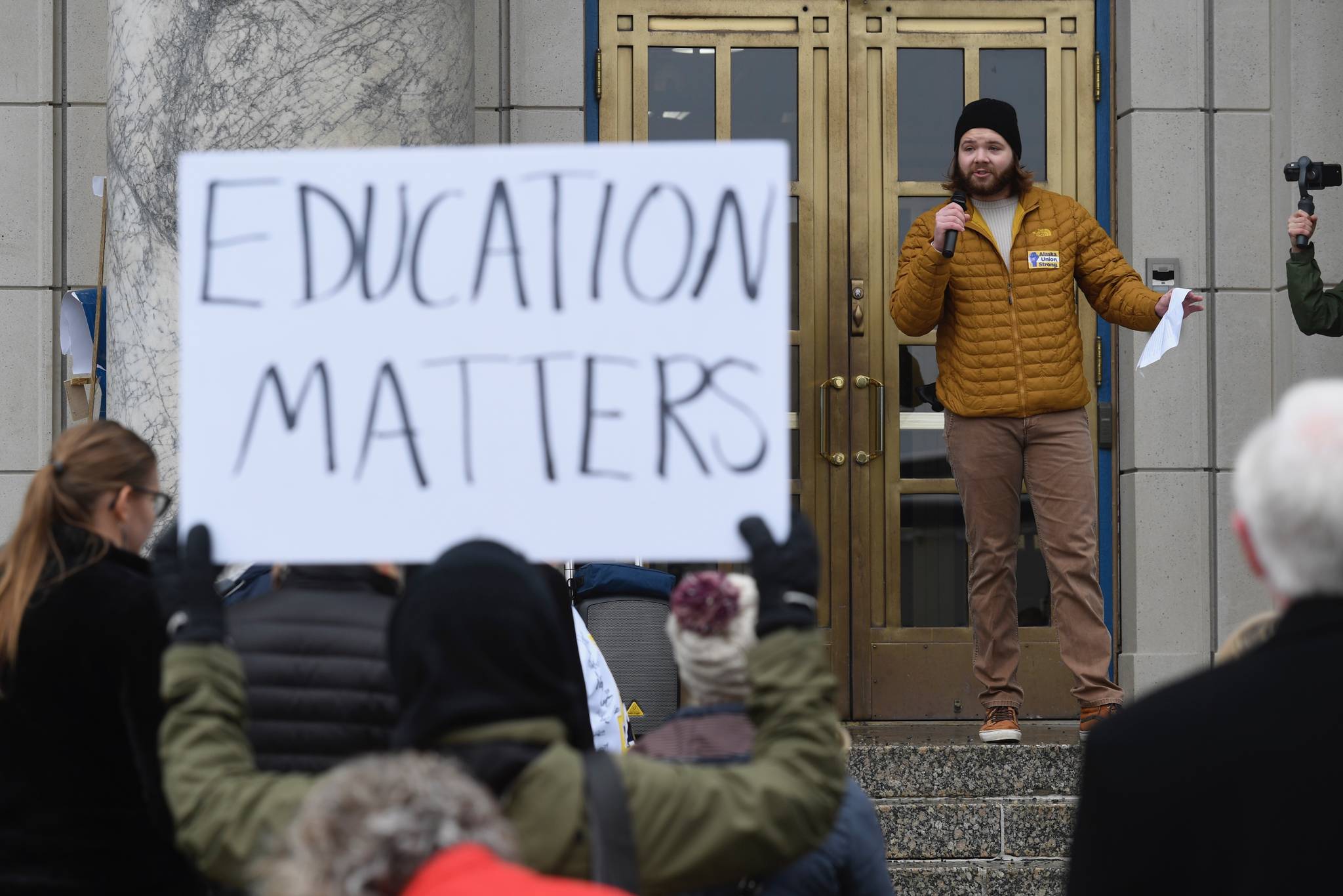 UAS Student Body President Nick Bursell speaks at a rally for funding the University of Alaska in front of the Capitol on Wednesday, Feb. 13, 2019. (Michael Penn | Juneau Empire)