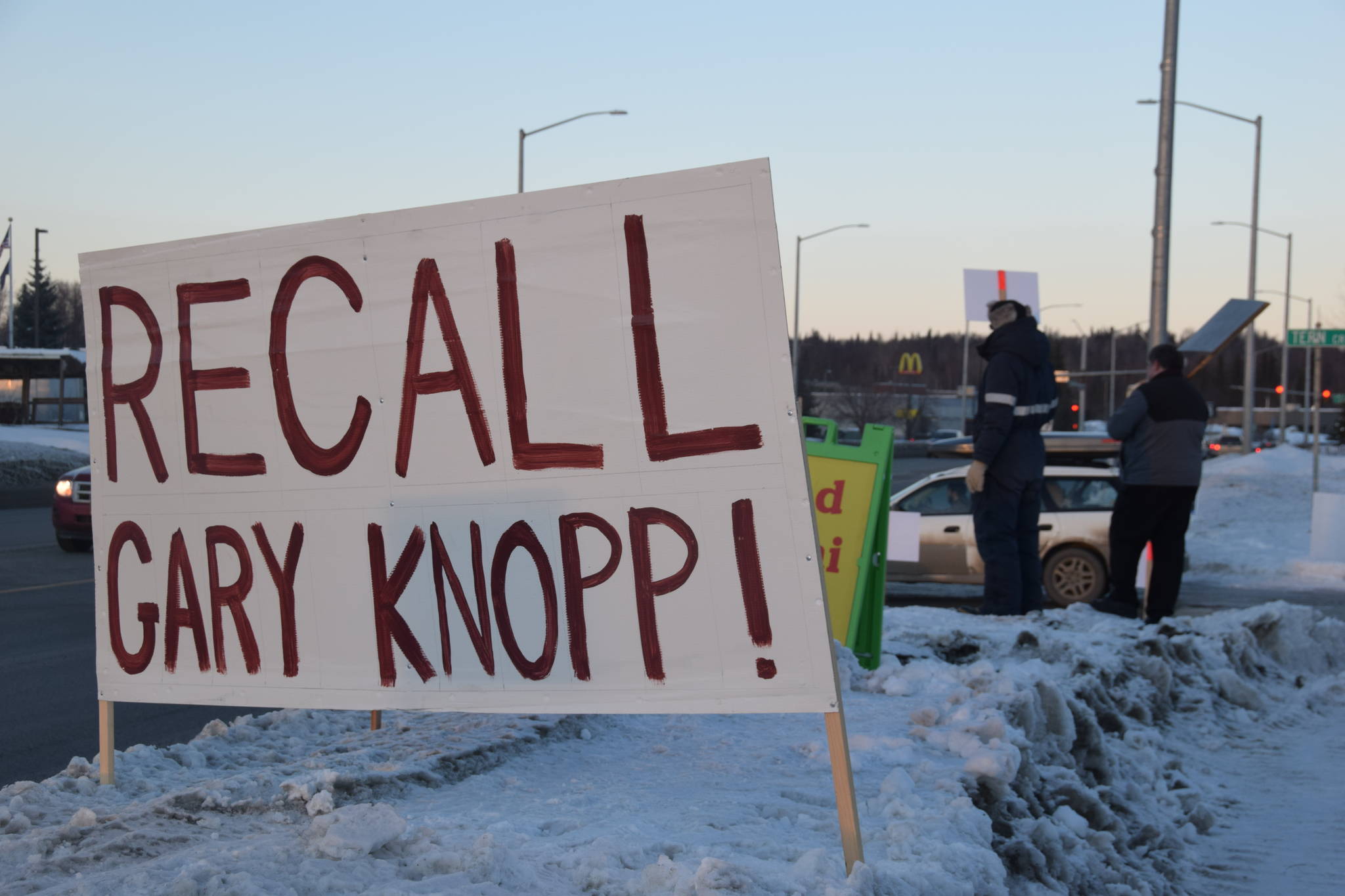 Protestors stand outside the town hall hosted by Rep. Gary Knopp, R- Soldotna at the Kenai River Suites in Soldotna on Feb. 15, 2019. (Photo by Brian Mazurek/Peninsula Clarion)