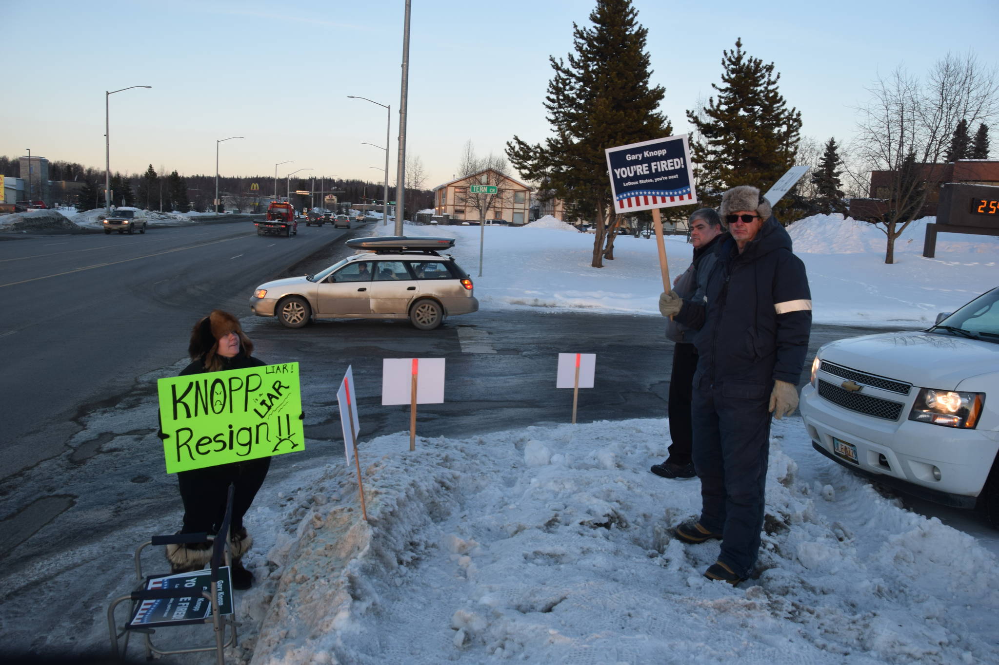 Protestors stand outside the town hall hosted by Rep. Gary Knopp, R- Soldotna at the Kenai River Suites in Soldotna on Feb. 15, 2019. (Photo by Brian Mazurek/Peninsula Clarion)