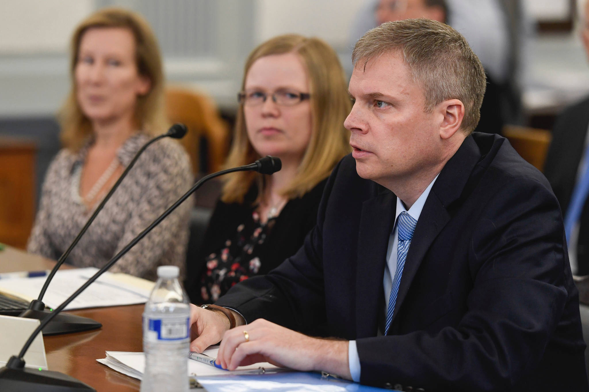 Dr. Michael Johnson, Commissioner of Alaska Department of Education and Early Development, speaks about a reduced funding for education to the Senate Finance Committee at the Capitol on Monday Feb. 18, 2019. (Michael Penn/ Juneau Empire)