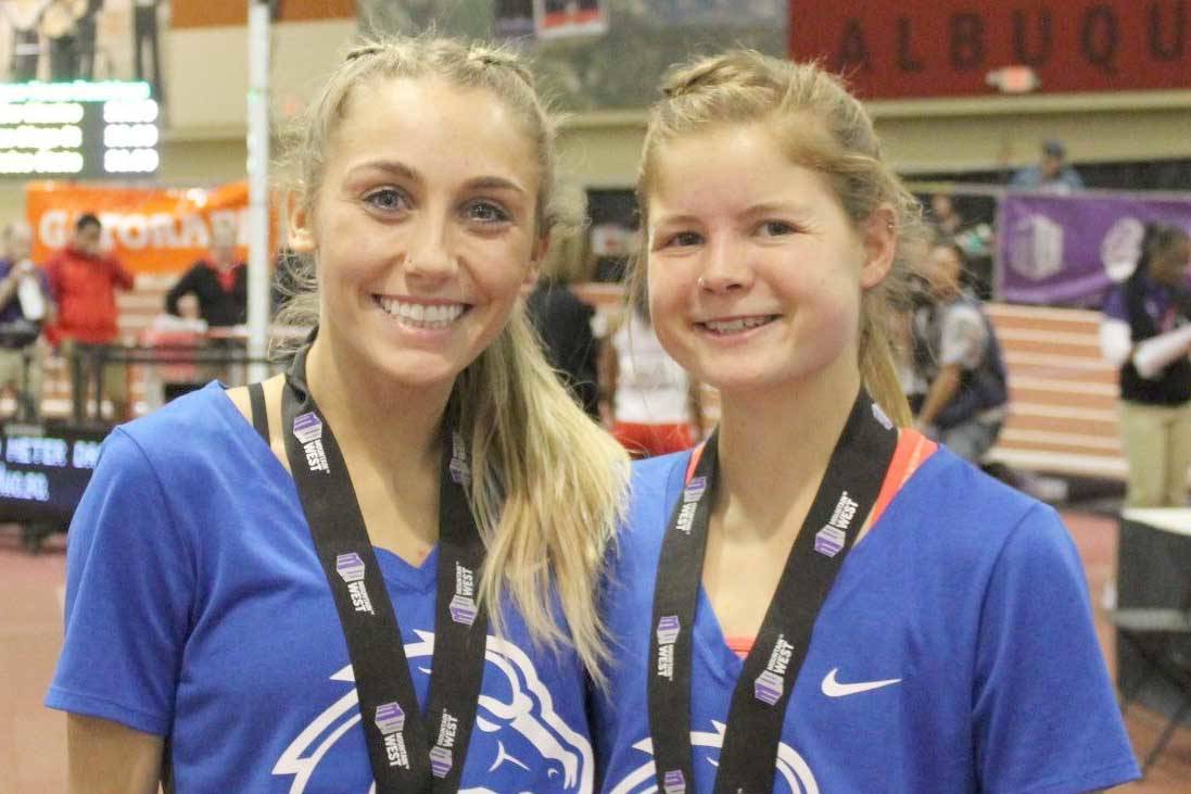 Boise State teammates Alexis Fuller and Allie Ostrander after Ostrander was second and Fuller was third in the mile Saturday at the Mountain West Indoor Track and Field Championships in Albuquerque, New Mexico. (Boise State Sports Information)