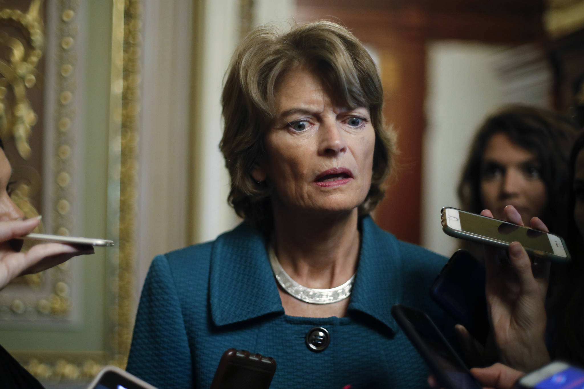 In this Oct. 4, 2018 file photo, Sen. Lisa Murkowski, R-Alaska, speaks to members of the media on Capitol Hill in Washington. The fight over President Donald Trump’s border wall is heading to the GOP-controlled U.S. Senate, putting Republicans in the uncomfortable spot of deciding whether to back his declaration of a national emergency. (AP Photo/Pablo Martinez Monsivais)