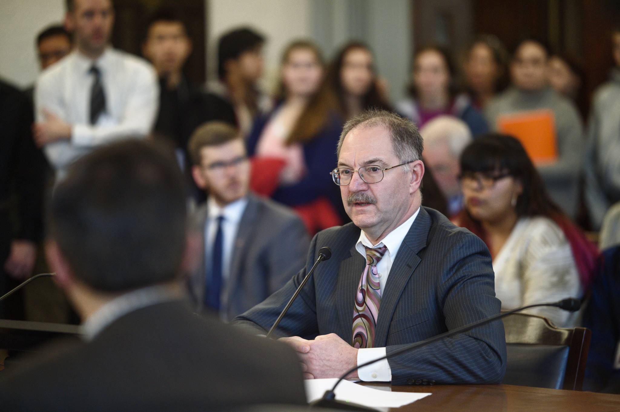 David Teal, Director of the Legislative Finance Division, gives his analysis of Gov. Mike Dunleavy’s state budget to the Senate Finance Committee at the Capitol on Tuesday, Feb. 26, 2019. (Michael Penn | Juneau Empire)