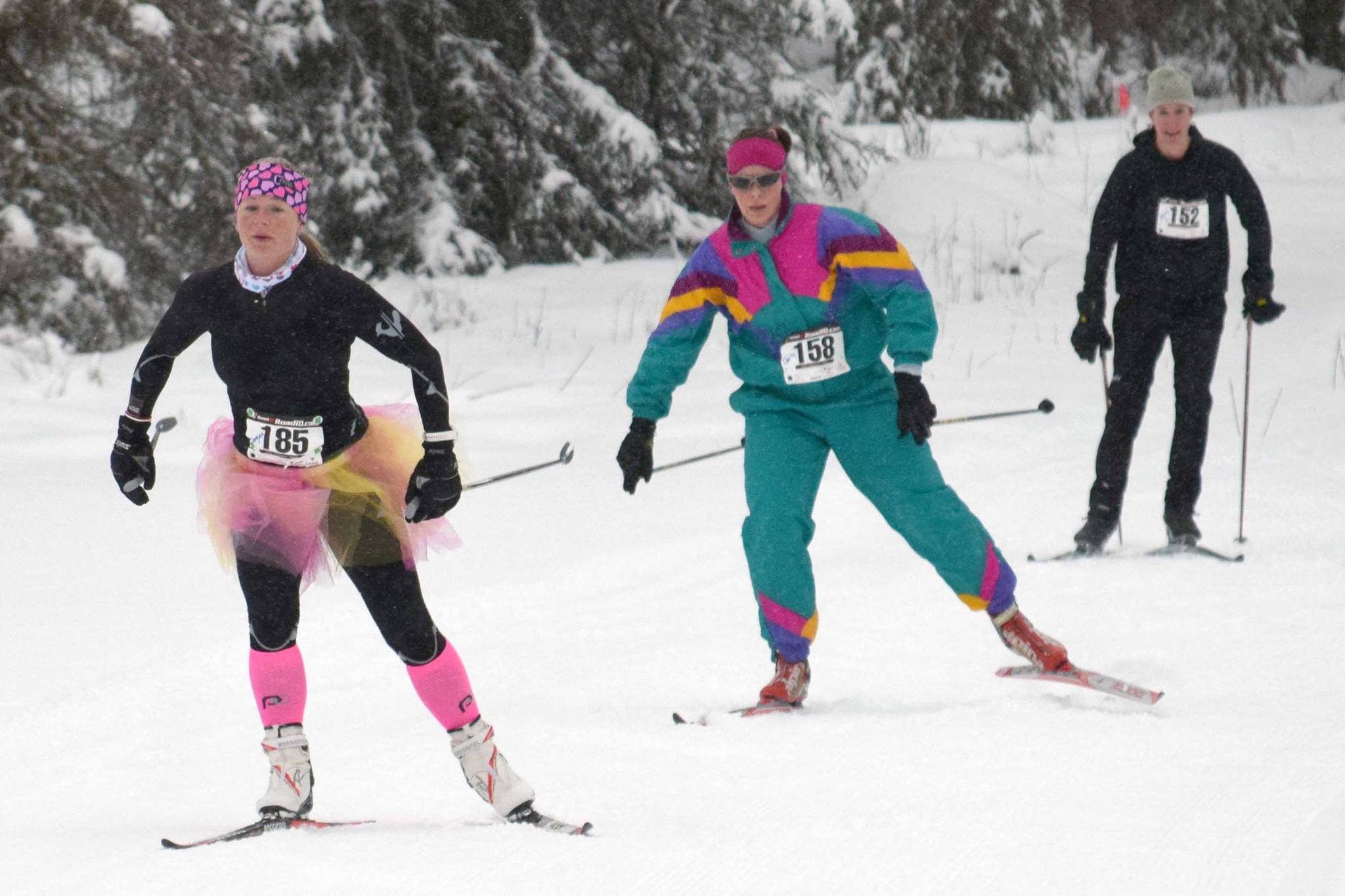 Eventual race winner Morgan Aldridge leads Carly Reimer and Amy Anderson at the Ski for Women on Sunday, Feb. 3, 2019, at Tsalteshi Trails. (Photo by Jeff Helminiak/Peninsula Clarion)