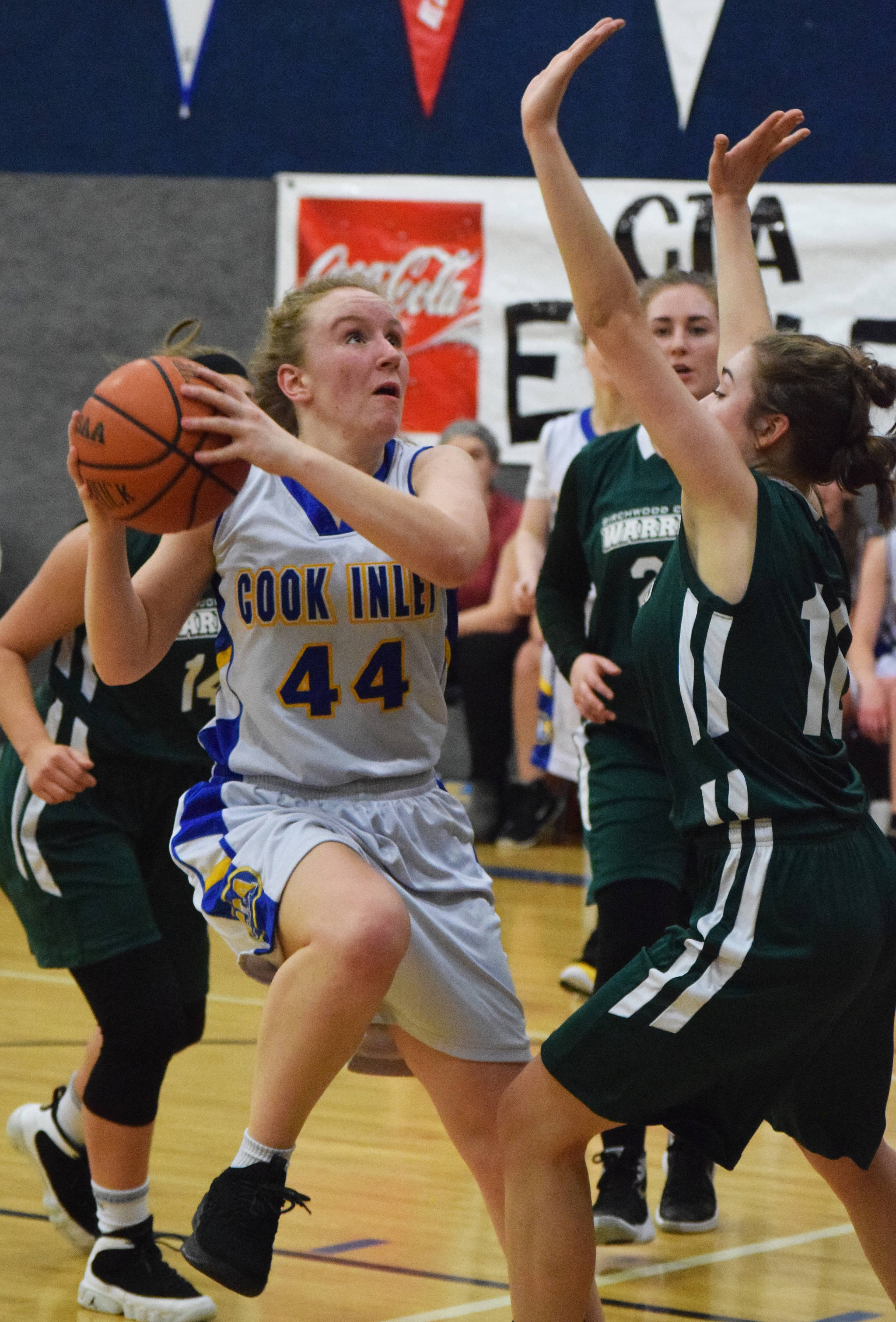 Cook Inlet Academy’s Adara Warren (44) steps back for a shot against a Birchwood Christian defender Wednesday at the 2019 Peninsula Conference championship tournament at Cook Inlet Academy in Soldotna. (Photo by Joey Klecka/Peninsula Clarion)