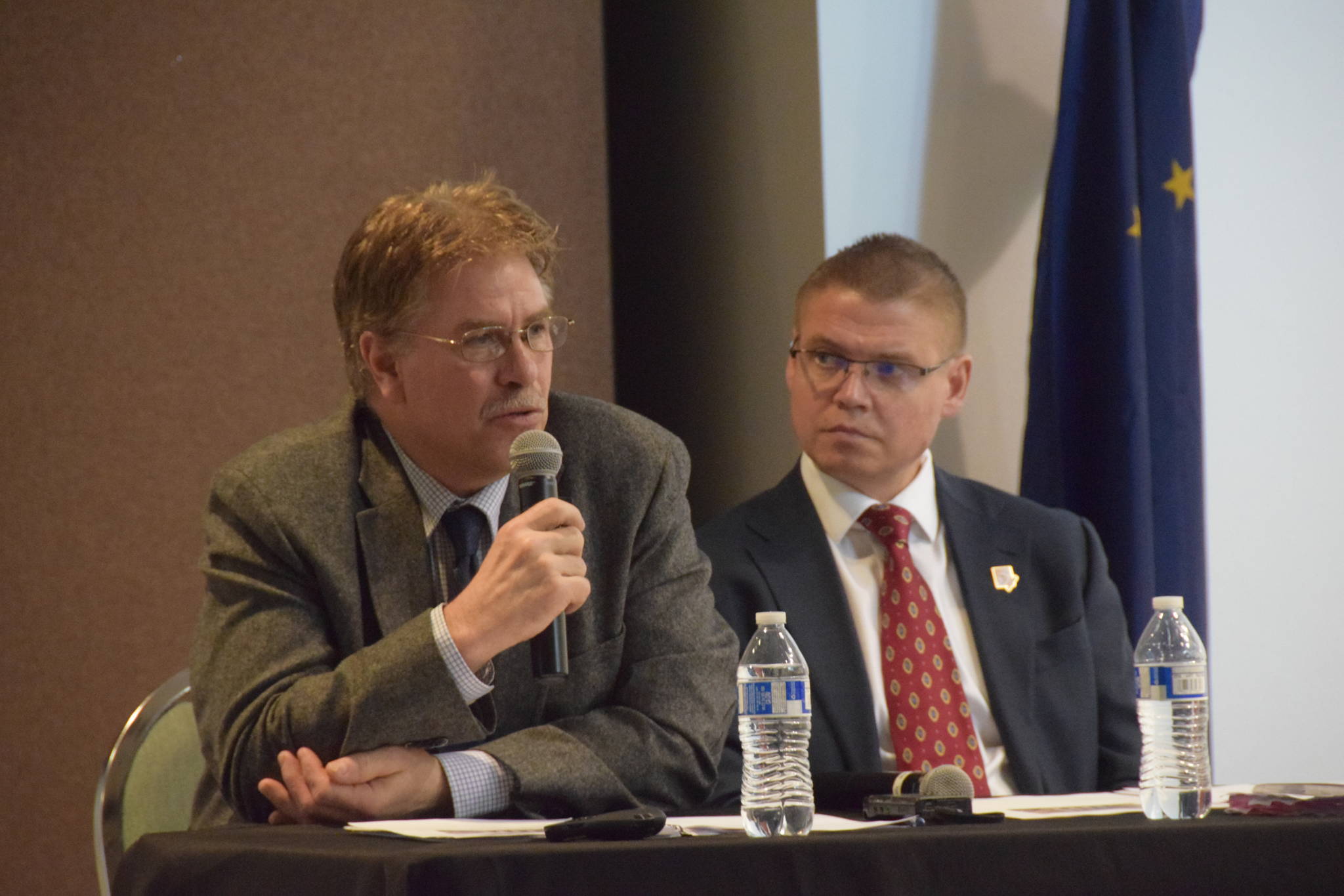 Kenai Mayor Brian Gabriel and City Manager Paul Ostrander give a presentation to the Kenai Chamber of Commerce on Wednesday. (Photo by Brian Mazurek/Peninsula Clarion)