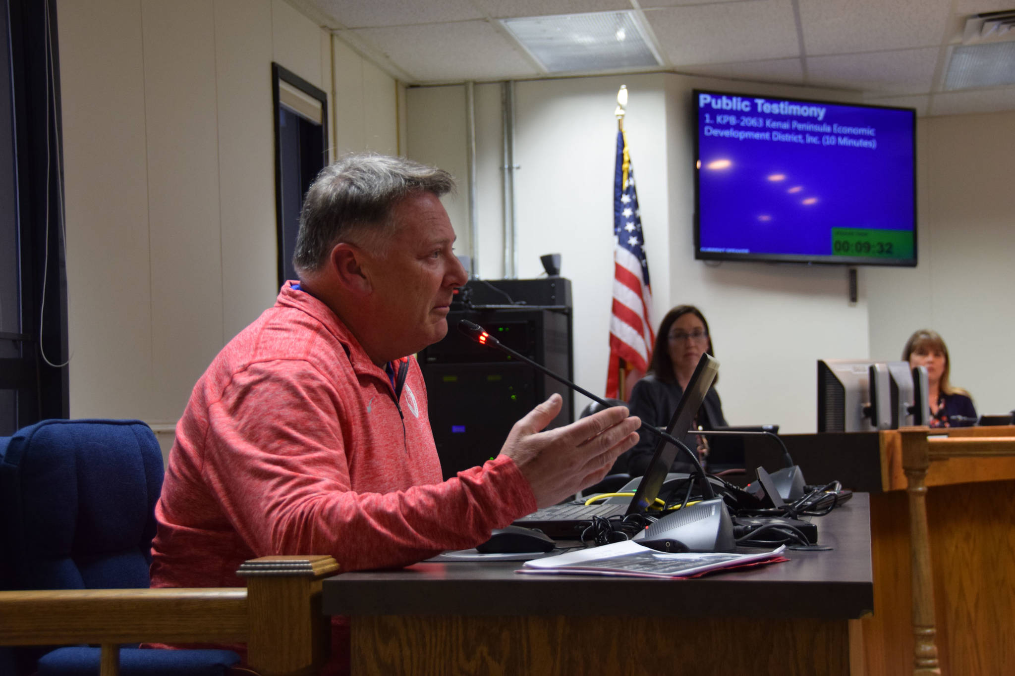 KPEDD Executive Director Tim Dillon gives a presentation at the Kenai Peninsula Borough Assembly meeting in Soldotna on Tuesday. (Photo by Brian Mazurek/Peninsula Clarion)