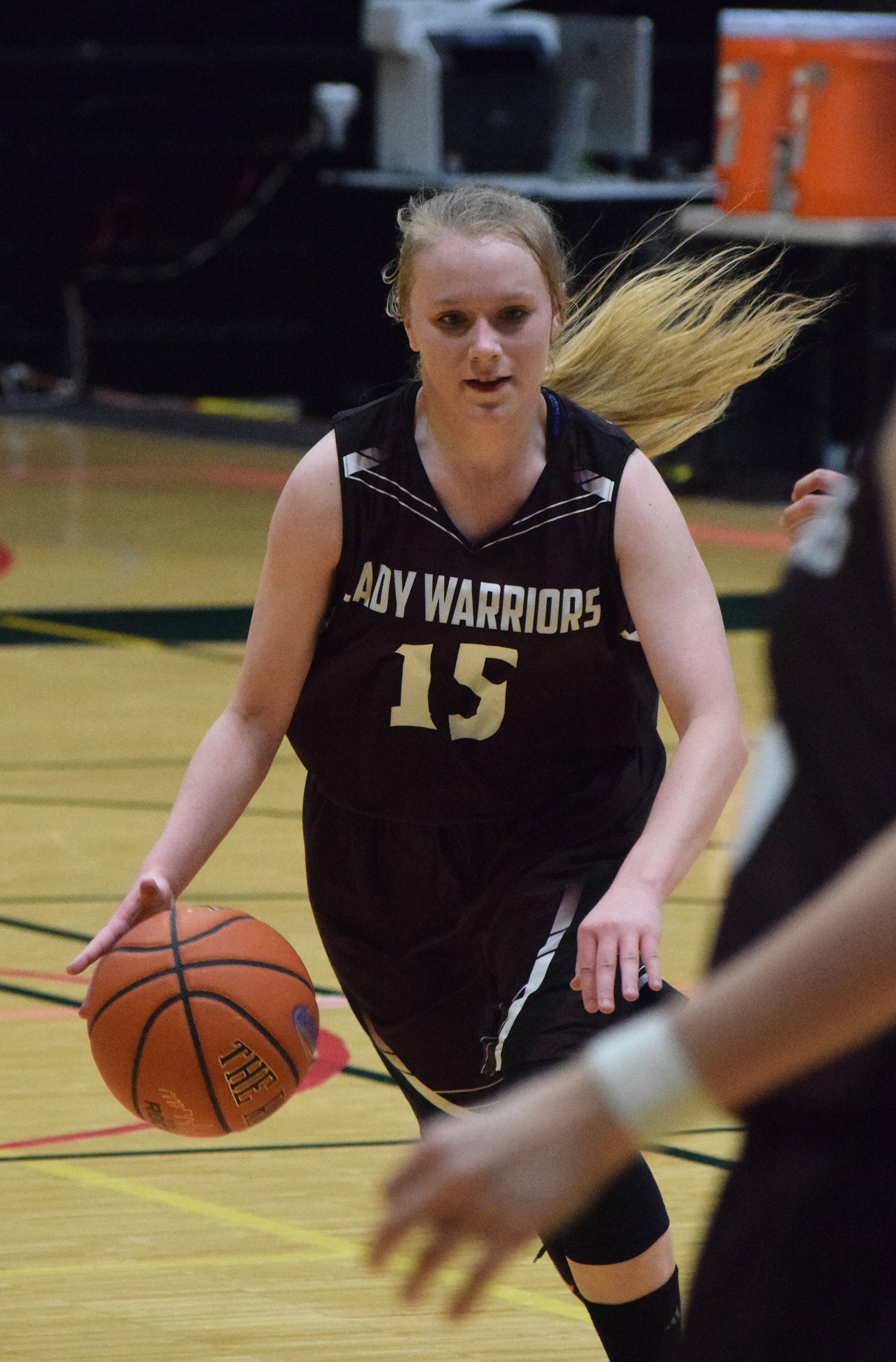 Nikolaevsk’s Markiana Yakunin looks for space Wednesday against Newhalen at the Class 1A state basketball championships at the Alaska Airlines Center in Anchorage. (Photo by Joey Klecka/Peninsula Clarion)