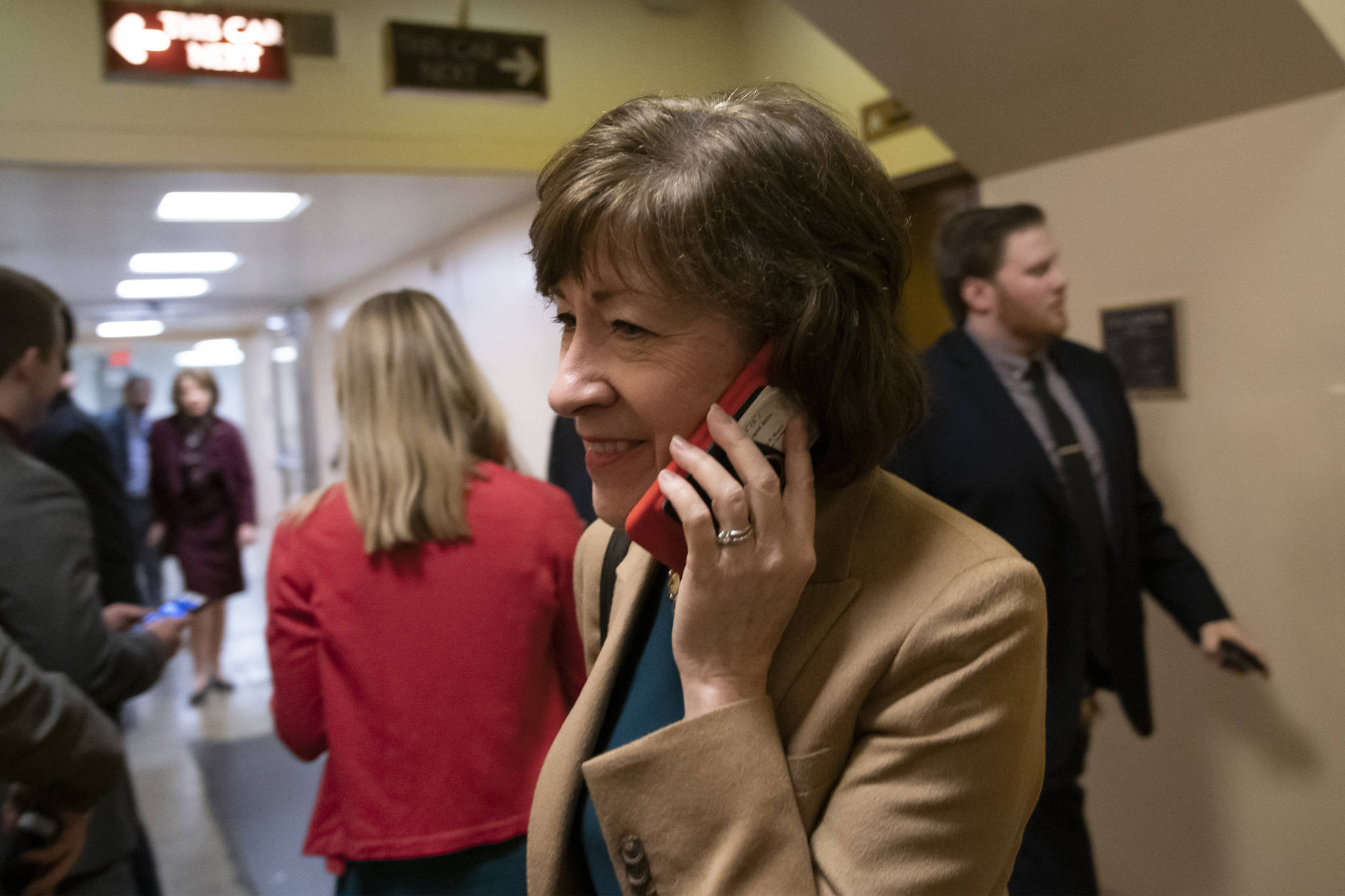 Sen. Susan Collins, R-Maine, arrives in the Senate where she has said she will vote for a resolution to annul President Donald Trump’s declaration of a national emergency at the southwest border, on Capitol Hill in Washington, Thursday, March 14, 2019. (AP Photo/J. Scott Applewhite)