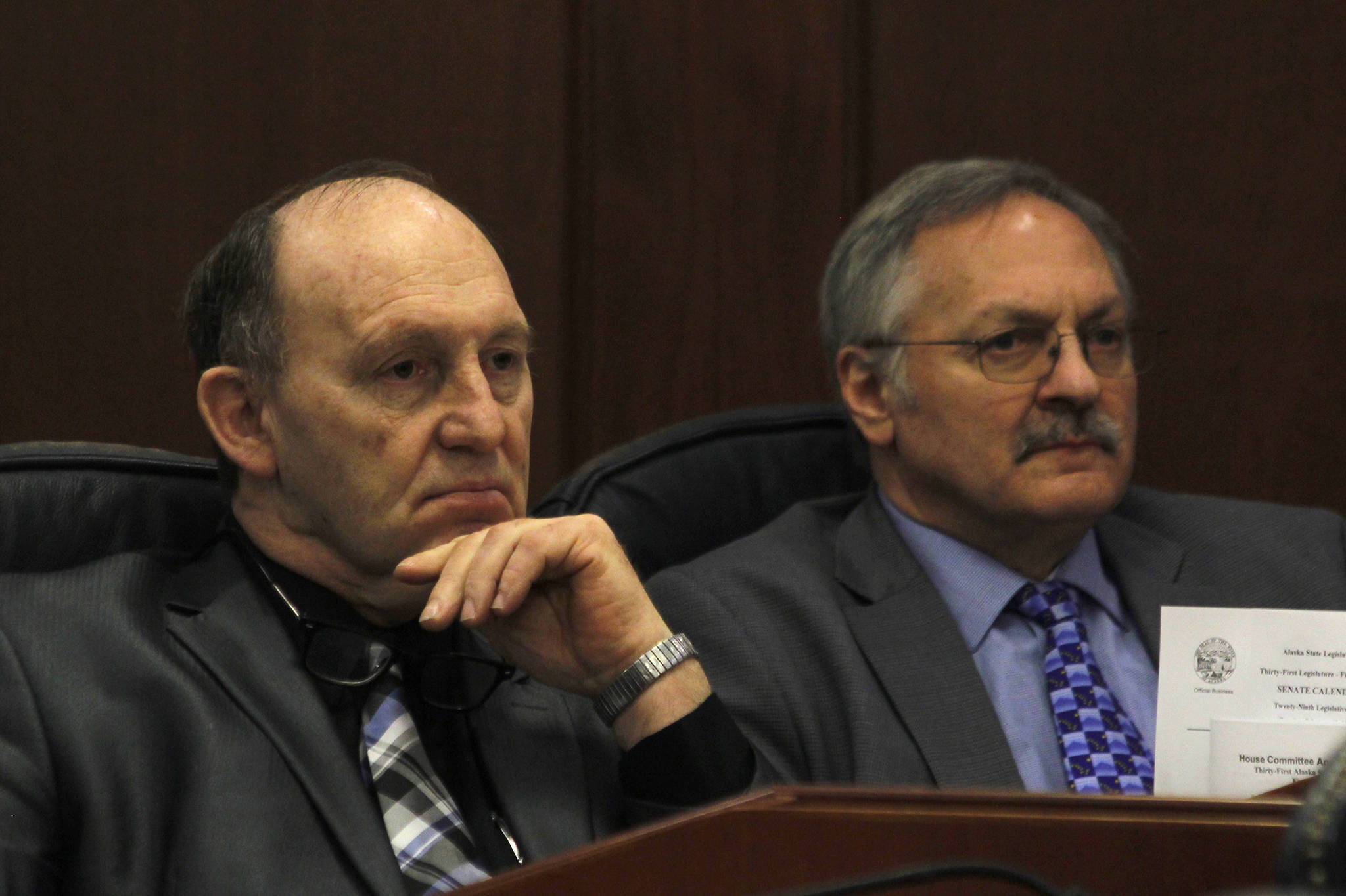 Rep. Gary Knopp, R-Kenai, and Rep. Dave Talerico, R-Healy, sit next to each other after Knopp voted not to confirm Talerico as Speaker of the House on Tuesday. (Alex McCarthy | Juneau Empire)