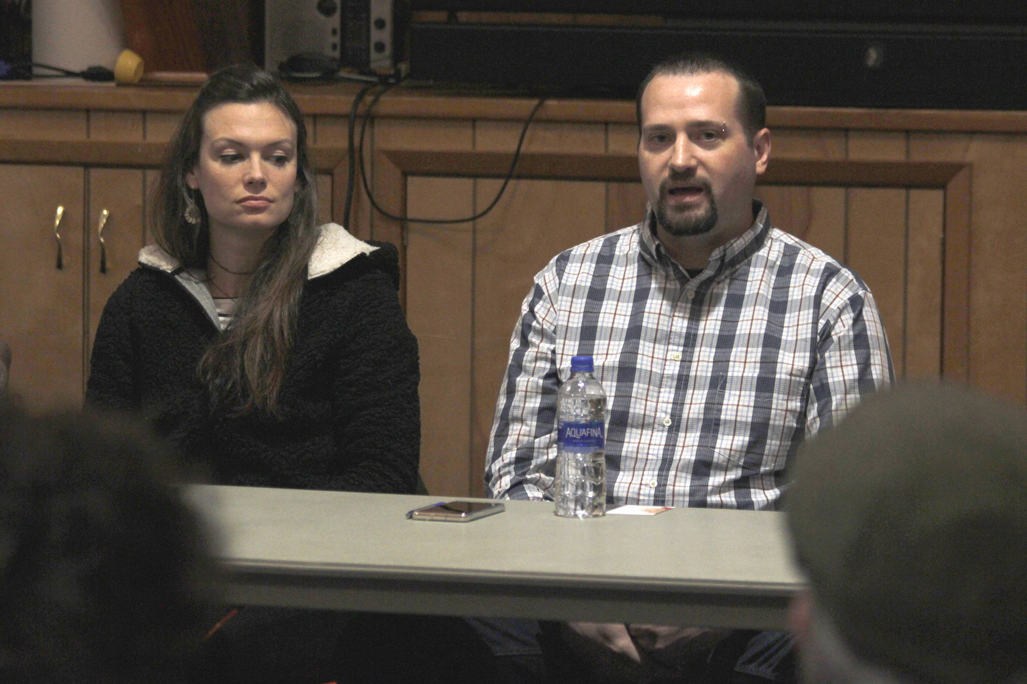 JAMHI Health and Wellness employees Carrie Amott and Mike Van Linden, both of whom are in long-term recovery, speak about their experiences and views on Senate Bill 91 at Northern Light United Church on Saturday, March 16, 2019. (Alex McCarthy | Juneau Empire)