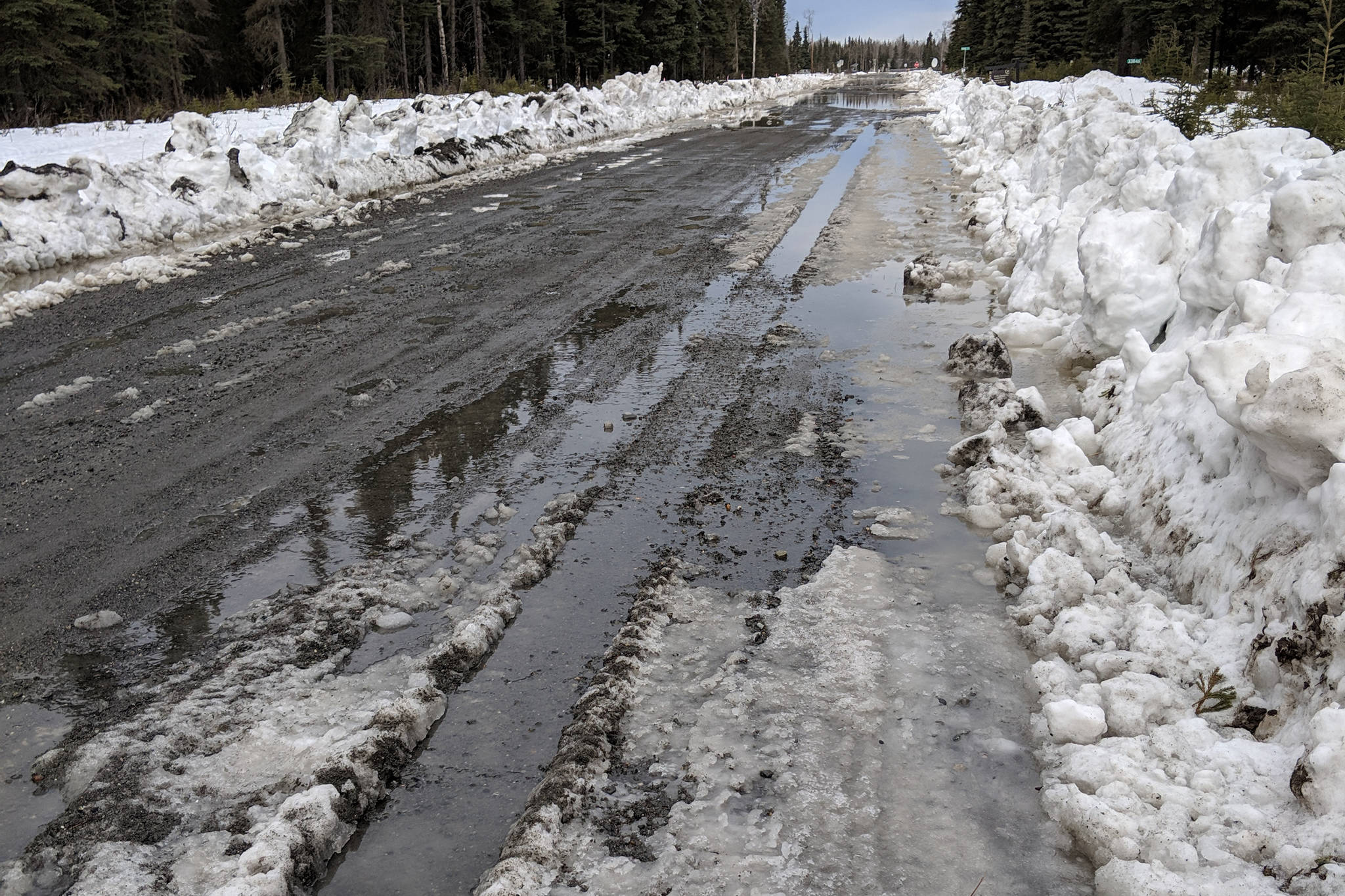 The spring thaw floods a street in Soldotna, Alaska, in March 2019. (Photo by Erin Thompson/Peninsula Clarion)