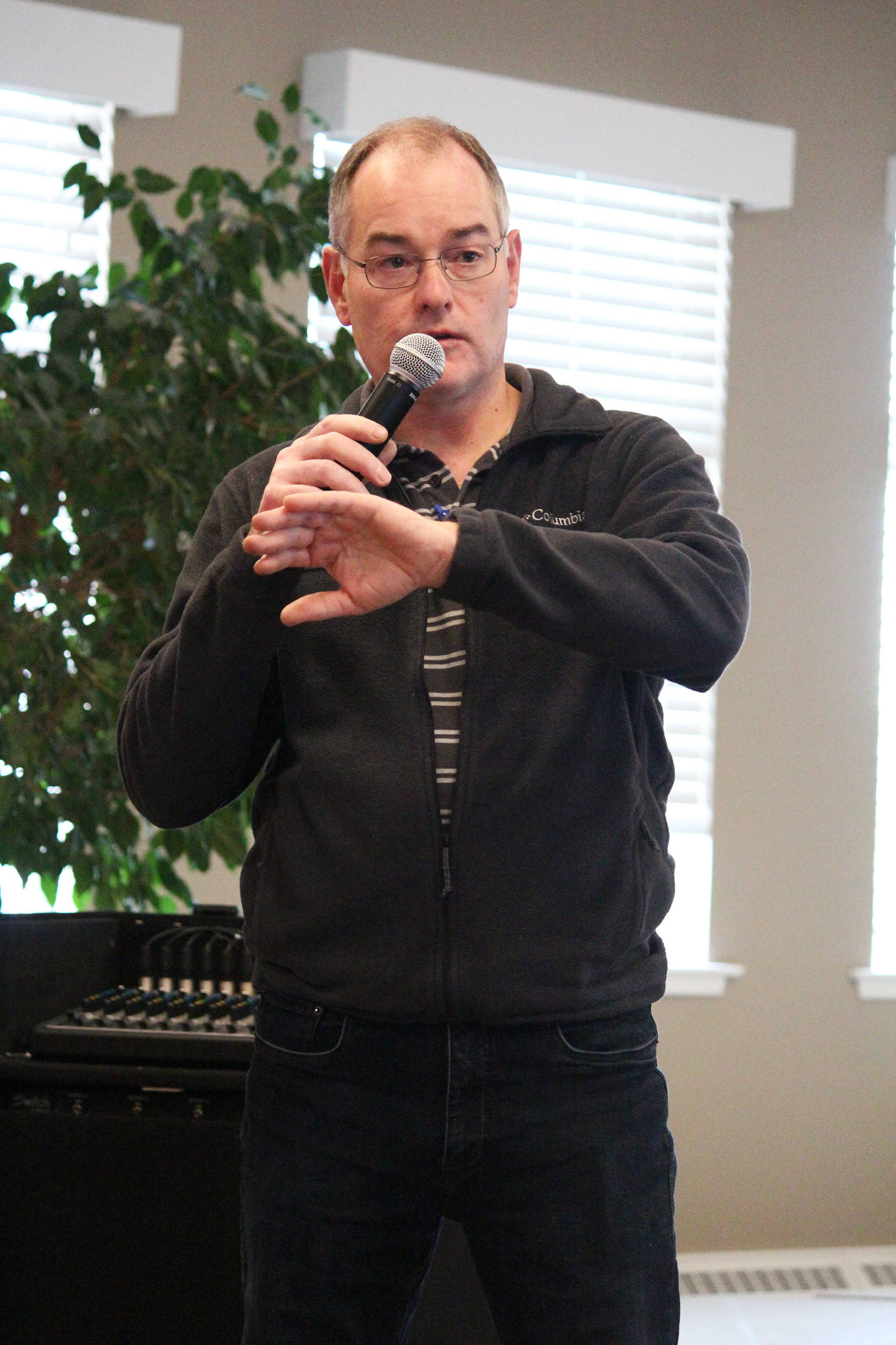 James Fueg, vice president of permitting for the Pebble Limited Partnership, speaks to a crowd of people at a community meeting Tuesday, March 19, 2019 at Land’s End Resort in Homer, Alaska. (Photo by Megan Pacer/Homer News)